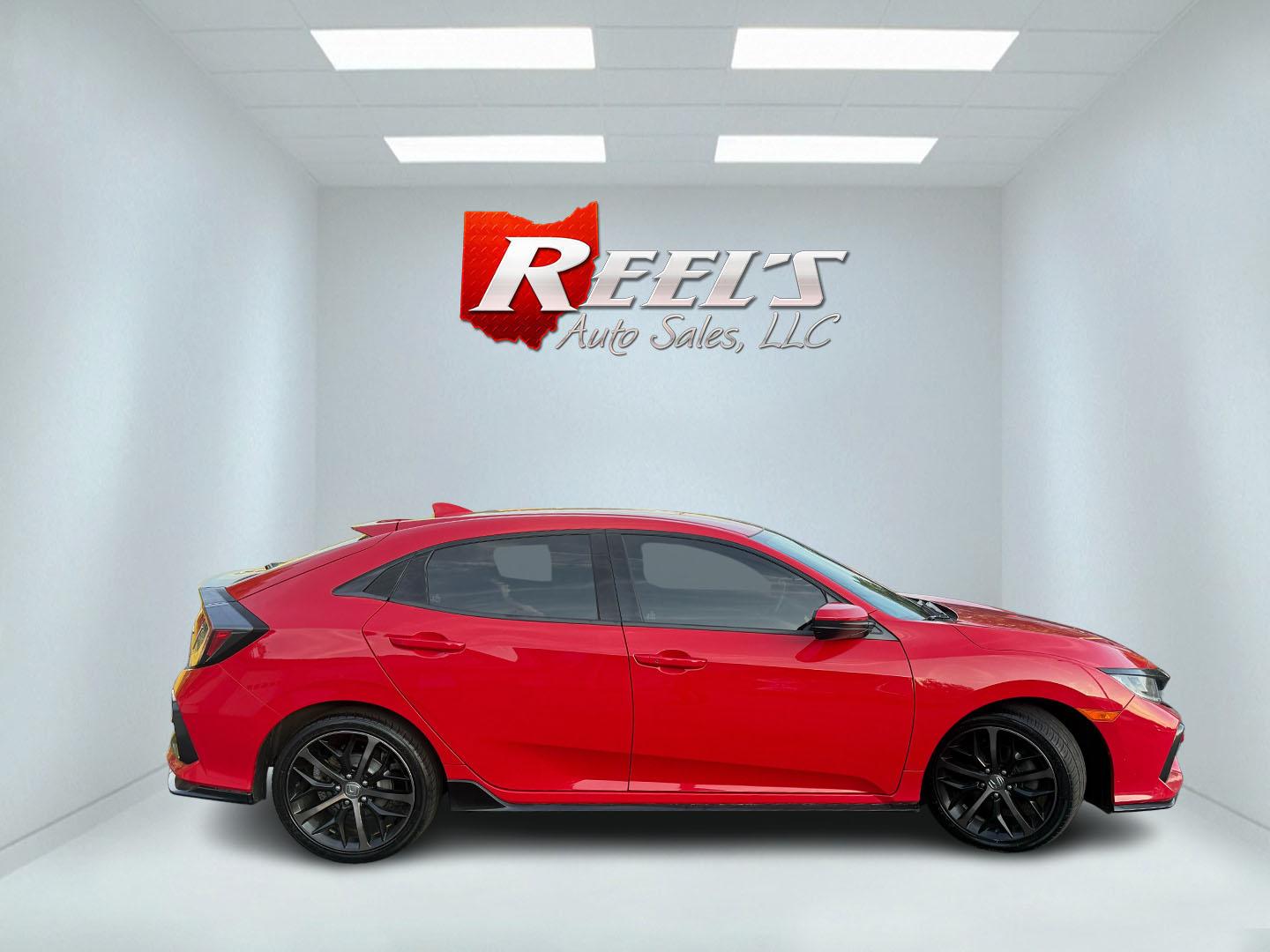 2021 Red /Black Honda Civic Sport Hatchback CVT (SHHFK7H42MU) with an 1.5L I4 16V DOHC TURBO engine, Automatic transmission, located at 547 E. Main St., Orwell, OH, 44076, (440) 437-5893, 41.535435, -80.847855 - 2021 Honda Civic Hatchback Sport – Efficient, Sporty, and Easy to Live With If you want a compact hatchback that feels current, efficient, and enjoyable to drive, this 2021 Honda Civic Hatchback Sport is a strong option. The 1.5L Turbocharged engine delivers responsive power and an impressive 40- Photo#18