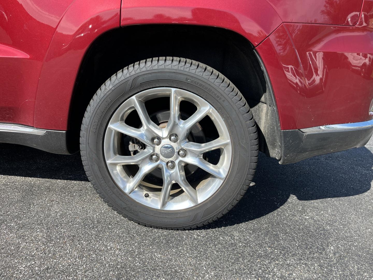 2014 Red /Black Jeep Grand Cherokee Summit 4WD (1C4RJFJT8EC) with an 5.7L V8 OHV 16V engine, Automatic transmission, located at 11115 Chardon Rd. , Chardon, OH, 44024, (440) 214-9705, 41.580246, -81.241943 - 2014 Jeep Grand Cherokee Summit 4WD – Premium HEMI Capability with Low Miles and One-Owner History If you want a luxury SUV that can still tow and handle changing conditions, this 2014 Jeep Grand Cherokee Summit 4WD is a standout. The 5.7L HEMI V8 and 8-speed automatic deliver strong power and a- Photo#10