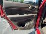 2014 Red /Black Jeep Grand Cherokee Summit 4WD (1C4RJFJT8EC) with an 5.7L V8 OHV 16V engine, Automatic transmission, located at 11115 Chardon Rd. , Chardon, OH, 44024, (440) 214-9705, 41.580246, -81.241943 - 2014 Jeep Grand Cherokee Summit 4WD – Premium HEMI Capability with Low Miles and One-Owner History If you want a luxury SUV that can still tow and handle changing conditions, this 2014 Jeep Grand Cherokee Summit 4WD is a standout. The 5.7L HEMI V8 and 8-speed automatic deliver strong power and a- Photo#26