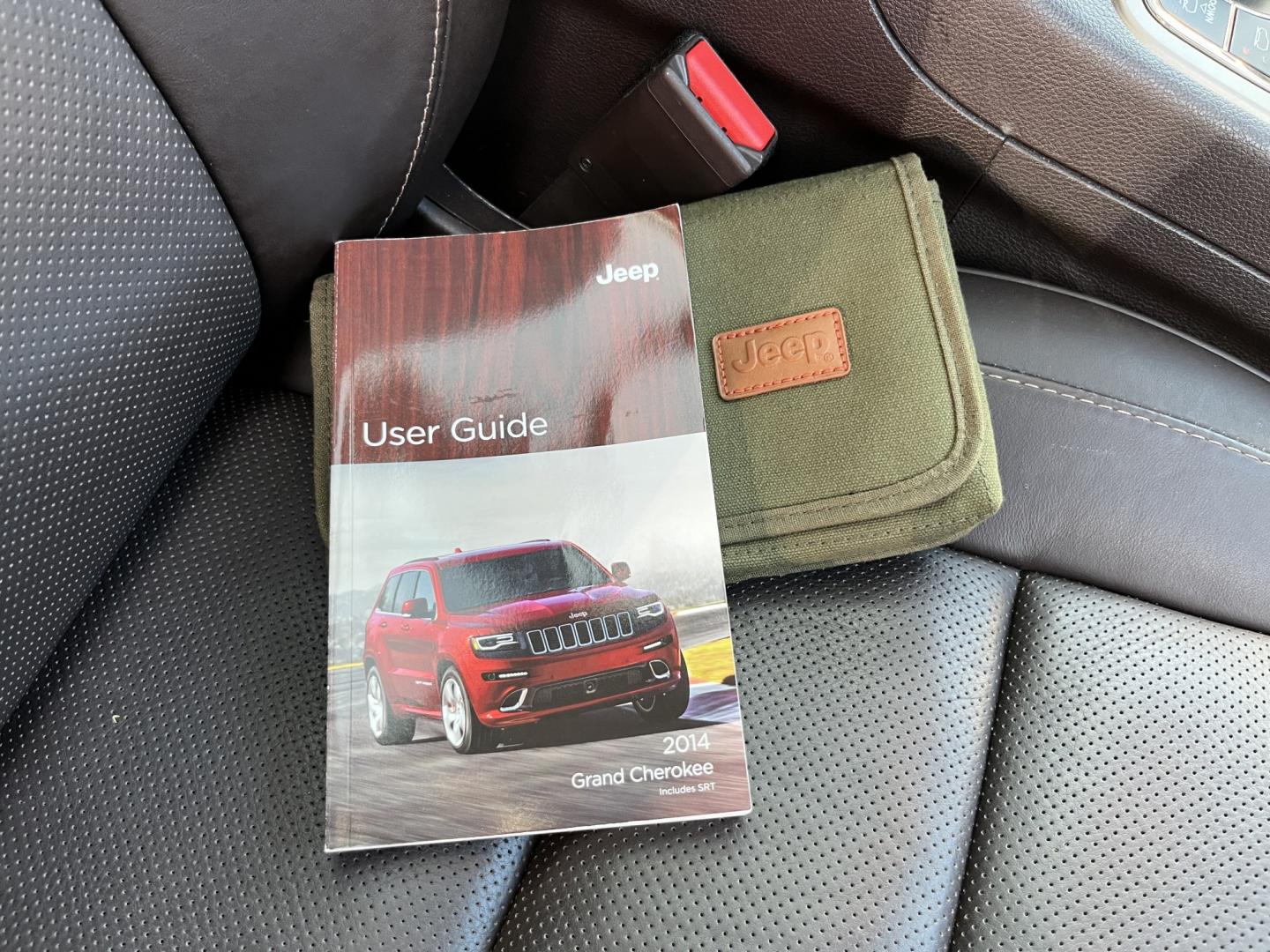 2014 Red /Black Jeep Grand Cherokee Summit 4WD (1C4RJFJT8EC) with an 5.7L V8 OHV 16V engine, Automatic transmission, located at 11115 Chardon Rd. , Chardon, OH, 44024, (440) 214-9705, 41.580246, -81.241943 - 2014 Jeep Grand Cherokee Summit 4WD – Premium HEMI Capability with Low Miles and One-Owner History If you want a luxury SUV that can still tow and handle changing conditions, this 2014 Jeep Grand Cherokee Summit 4WD is a standout. The 5.7L HEMI V8 and 8-speed automatic deliver strong power and a- Photo#38
