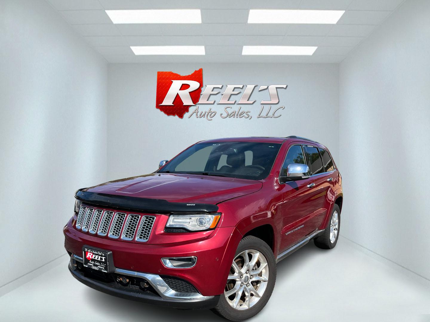 2014 Red /Black Jeep Grand Cherokee Summit 4WD (1C4RJFJT8EC) with an 5.7L V8 OHV 16V engine, Automatic transmission, located at 11115 Chardon Rd. , Chardon, OH, 44024, (440) 214-9705, 41.580246, -81.241943 - 2014 Jeep Grand Cherokee Summit 4WD – Premium HEMI Capability with Low Miles and One-Owner History If you want a luxury SUV that can still tow and handle changing conditions, this 2014 Jeep Grand Cherokee Summit 4WD is a standout. The 5.7L HEMI V8 and 8-speed automatic deliver strong power and a- Photo#0