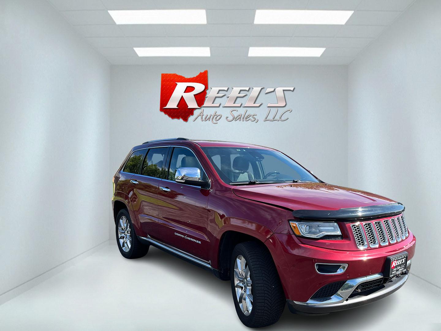 2014 Red /Black Jeep Grand Cherokee Summit 4WD (1C4RJFJT8EC) with an 5.7L V8 OHV 16V engine, Automatic transmission, located at 11115 Chardon Rd. , Chardon, OH, 44024, (440) 214-9705, 41.580246, -81.241943 - 2014 Jeep Grand Cherokee Summit 4WD – Premium HEMI Capability with Low Miles and One-Owner History If you want a luxury SUV that can still tow and handle changing conditions, this 2014 Jeep Grand Cherokee Summit 4WD is a standout. The 5.7L HEMI V8 and 8-speed automatic deliver strong power and a- Photo#2
