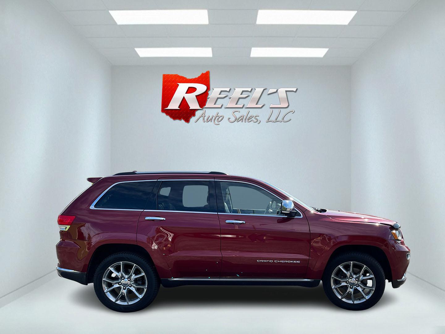 2014 Red /Black Jeep Grand Cherokee Summit 4WD (1C4RJFJT8EC) with an 5.7L V8 OHV 16V engine, Automatic transmission, located at 11115 Chardon Rd. , Chardon, OH, 44024, (440) 214-9705, 41.580246, -81.241943 - 2014 Jeep Grand Cherokee Summit 4WD – Premium HEMI Capability with Low Miles and One-Owner History If you want a luxury SUV that can still tow and handle changing conditions, this 2014 Jeep Grand Cherokee Summit 4WD is a standout. The 5.7L HEMI V8 and 8-speed automatic deliver strong power and a- Photo#5