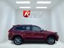 2014 Red /Black Jeep Grand Cherokee Summit 4WD (1C4RJFJT8EC) with an 5.7L V8 OHV 16V engine, Automatic transmission, located at 11115 Chardon Rd. , Chardon, OH, 44024, (440) 214-9705, 41.580246, -81.241943 - 2014 Jeep Grand Cherokee Summit 4WD – Premium HEMI Capability with Low Miles and One-Owner History If you want a luxury SUV that can still tow and handle changing conditions, this 2014 Jeep Grand Cherokee Summit 4WD is a standout. The 5.7L HEMI V8 and 8-speed automatic deliver strong power and a- Photo#5