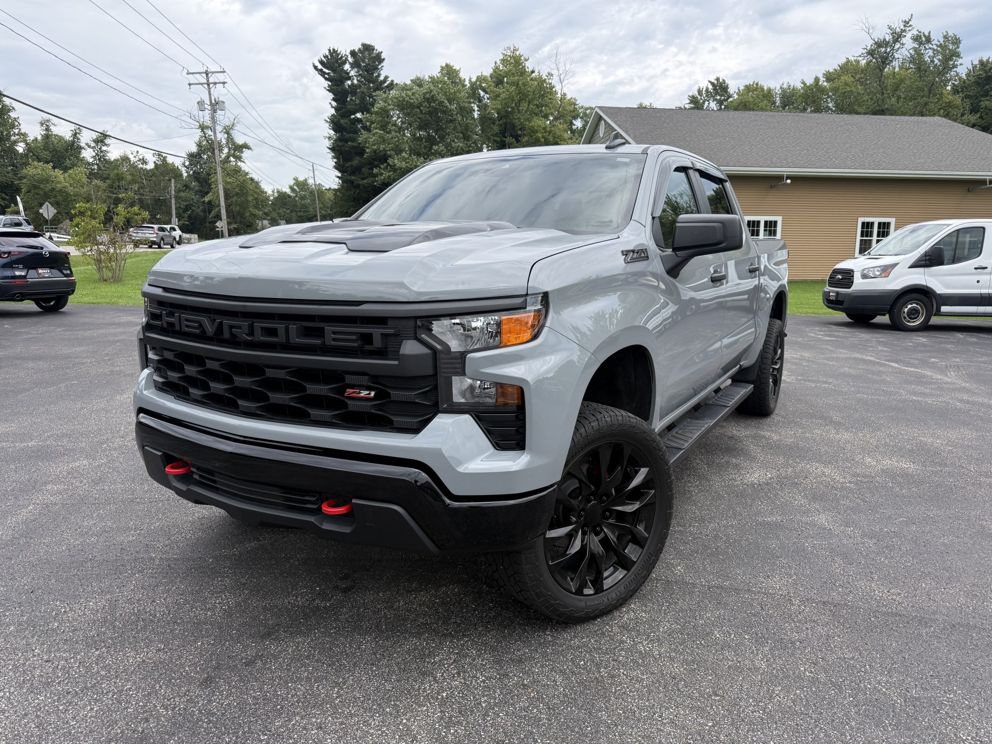photo of 2025 Chevrolet Silverado 1500 Trail Boss Custom Crew Cab 4WD