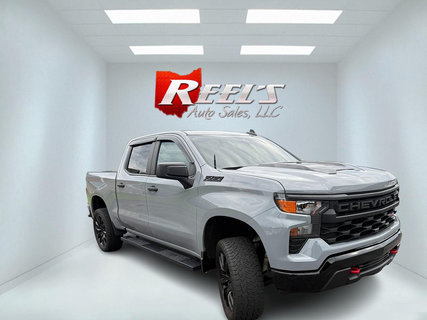 2025 Gray /Black Chevrolet Silverado 1500 Trail Boss Custom Crew Cab 4WD (3GCUKCED3SG) with an 5.3L V8 OHV 16V engine, Automatc transmission, located at 11115 Chardon Rd. , Chardon, OH, 44024, (440) 214-9705, 41.580246, -81.241943 - 2025 Chevrolet Silverado 1500 Custom Trail Boss Crew Cab 4WD – Lifted Stance, V8 Muscle, and Ready-for-Work Presence This is not a plain work truck. The 2025 Chevrolet Silverado 1500 Custom Trail Boss Crew Cab 4WD has the look and the hardware to stand out the moment it rolls in. Finished in Slat- Photo#2