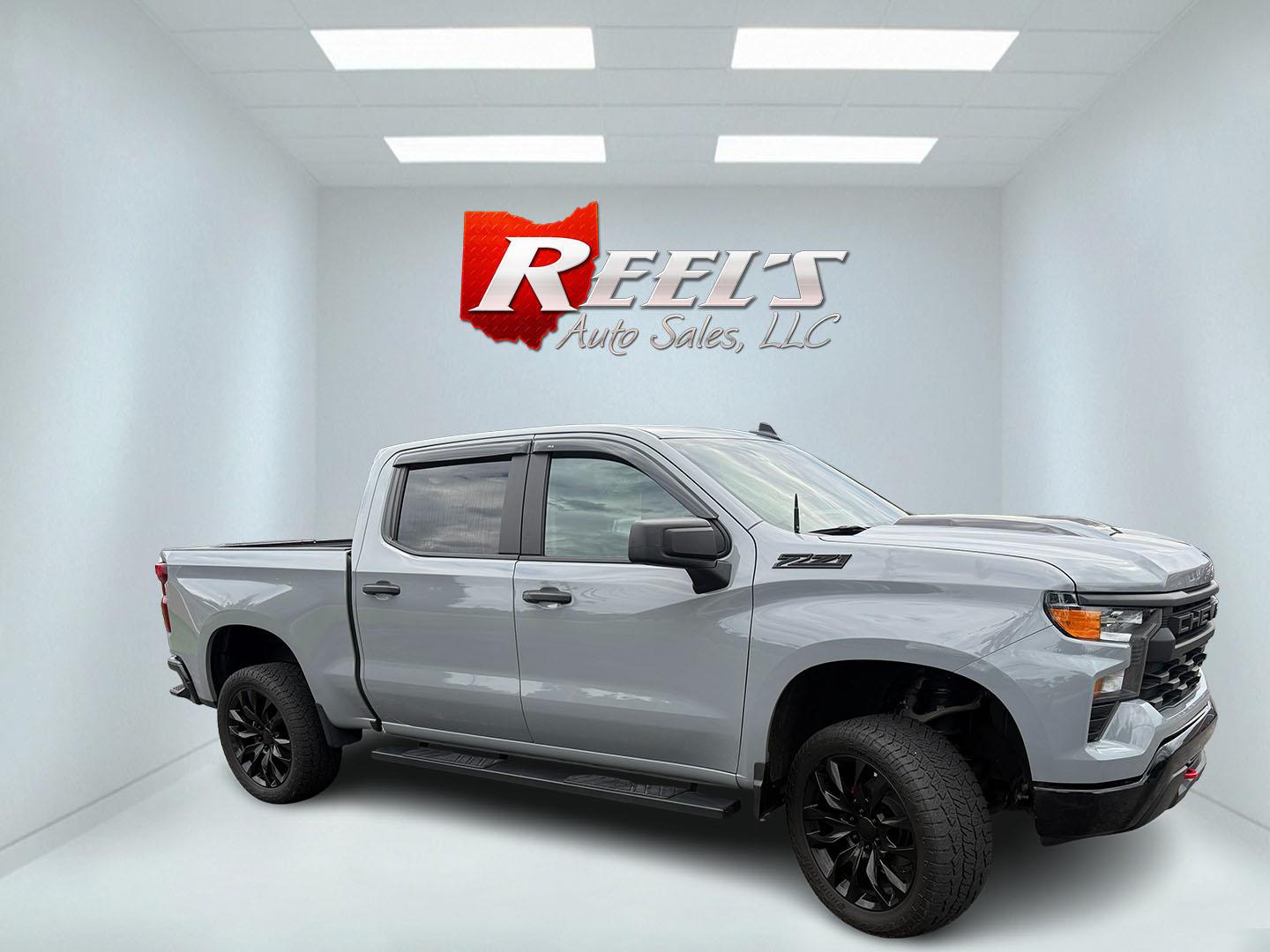 2025 Gray /Black Chevrolet Silverado 1500 Trail Boss Custom Crew Cab 4WD (3GCUKCED3SG) with an 5.3L V8 OHV 16V engine, Automatc transmission, located at 11115 Chardon Rd. , Chardon, OH, 44024, (440) 214-9705, 41.580246, -81.241943 - 2025 Chevrolet Silverado 1500 Custom Trail Boss Crew Cab 4WD – Lifted Stance, V8 Muscle, and Ready-for-Work Presence This is not a plain work truck. The 2025 Chevrolet Silverado 1500 Custom Trail Boss Crew Cab 4WD has the look and the hardware to stand out the moment it rolls in. Finished in Slat- Photo#3