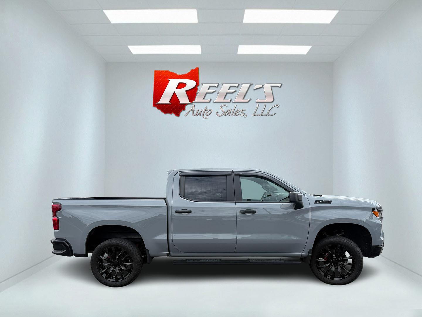 2025 Gray /Black Chevrolet Silverado 1500 Trail Boss Custom Crew Cab 4WD (3GCUKCED3SG) with an 5.3L V8 OHV 16V engine, Automatc transmission, located at 11115 Chardon Rd. , Chardon, OH, 44024, (440) 214-9705, 41.580246, -81.241943 - 2025 Chevrolet Silverado 1500 Custom Trail Boss Crew Cab 4WD – Lifted Stance, V8 Muscle, and Ready-for-Work Presence This is not a plain work truck. The 2025 Chevrolet Silverado 1500 Custom Trail Boss Crew Cab 4WD has the look and the hardware to stand out the moment it rolls in. Finished in Slat- Photo#23