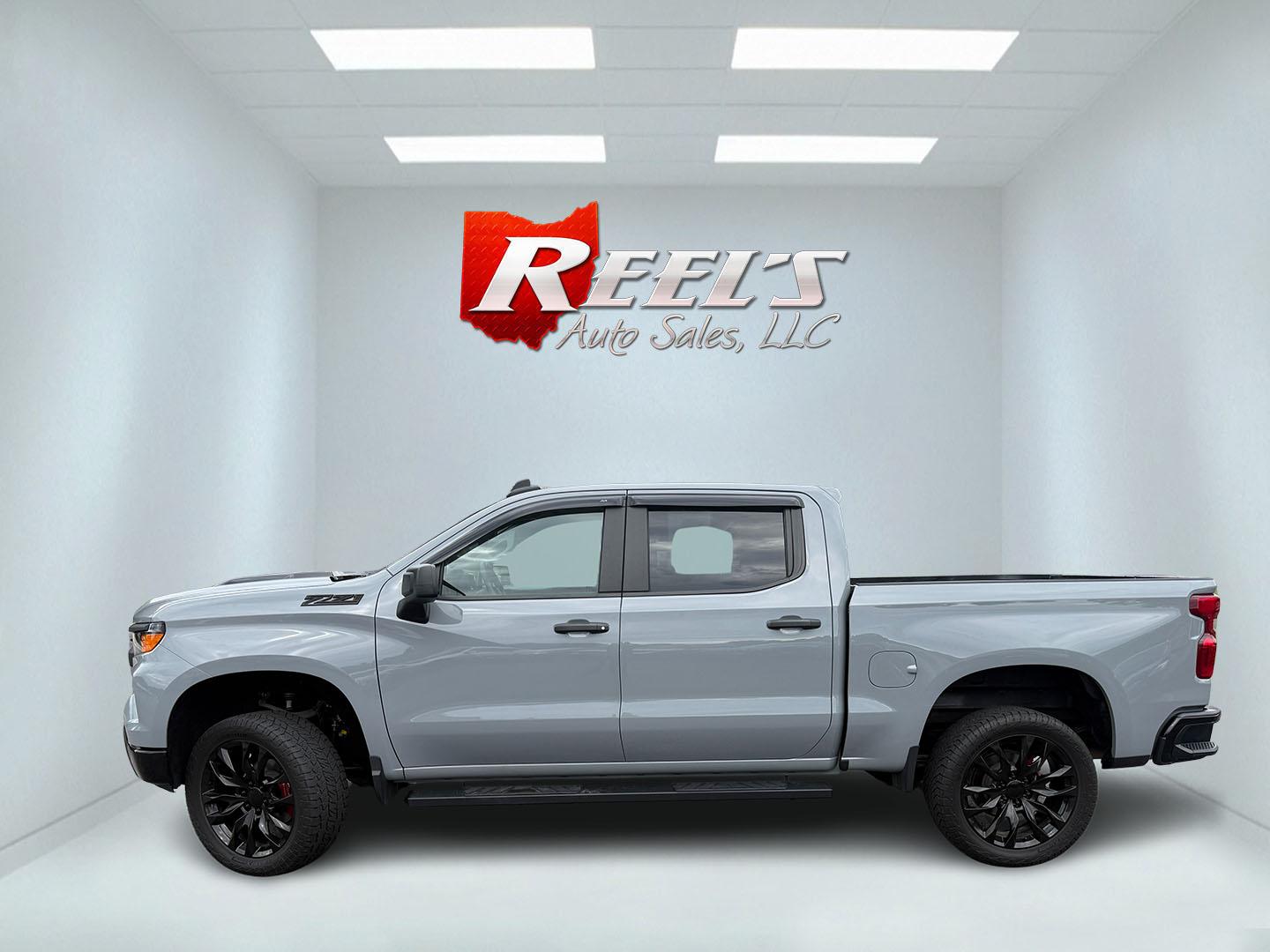 2025 Gray /Black Chevrolet Silverado 1500 Trail Boss Custom Crew Cab 4WD (3GCUKCED3SG) with an 5.3L V8 OHV 16V engine, Automatc transmission, located at 11115 Chardon Rd. , Chardon, OH, 44024, (440) 214-9705, 41.580246, -81.241943 - 2025 Chevrolet Silverado 1500 Custom Trail Boss Crew Cab 4WD – Lifted Stance, V8 Muscle, and Ready-for-Work Presence This is not a plain work truck. The 2025 Chevrolet Silverado 1500 Custom Trail Boss Crew Cab 4WD has the look and the hardware to stand out the moment it rolls in. Finished in Slat- Photo#31