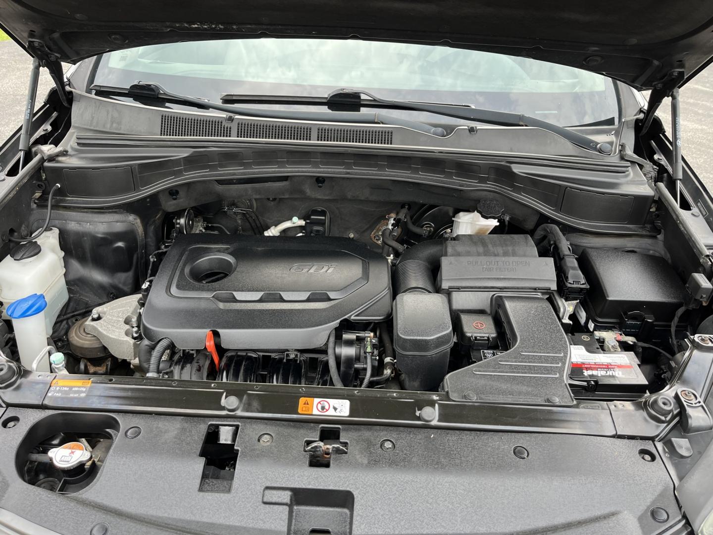 2017 Black /Tan Hyundai Santa Fe Sport 2.4 AWD (5NMZUDLB8HH) with an 2.4L I4 DOHC 16V engine, Automatc transmission, located at 11115 Chardon Rd. , Chardon, OH, 44024, (440) 214-9705, 41.580246, -81.241943 - 2017 Hyundai Santa Fe Sport AWD – Everyday Space with All-Weather Confidence Looking for a midsize SUV that stays useful without becoming complicated? This 2017 Hyundai Santa Fe Sport AWD is built for that kind of driving. The 2.4L GDI engine and 6-speed automatic give you smooth, dependable powe- Photo#13