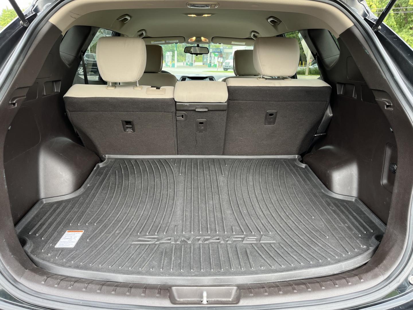 2017 Black /Tan Hyundai Santa Fe Sport 2.4 AWD (5NMZUDLB8HH) with an 2.4L I4 DOHC 16V engine, Automatc transmission, located at 11115 Chardon Rd. , Chardon, OH, 44024, (440) 214-9705, 41.580246, -81.241943 - 2017 Hyundai Santa Fe Sport AWD – Everyday Space with All-Weather Confidence Looking for a midsize SUV that stays useful without becoming complicated? This 2017 Hyundai Santa Fe Sport AWD is built for that kind of driving. The 2.4L GDI engine and 6-speed automatic give you smooth, dependable powe- Photo#14