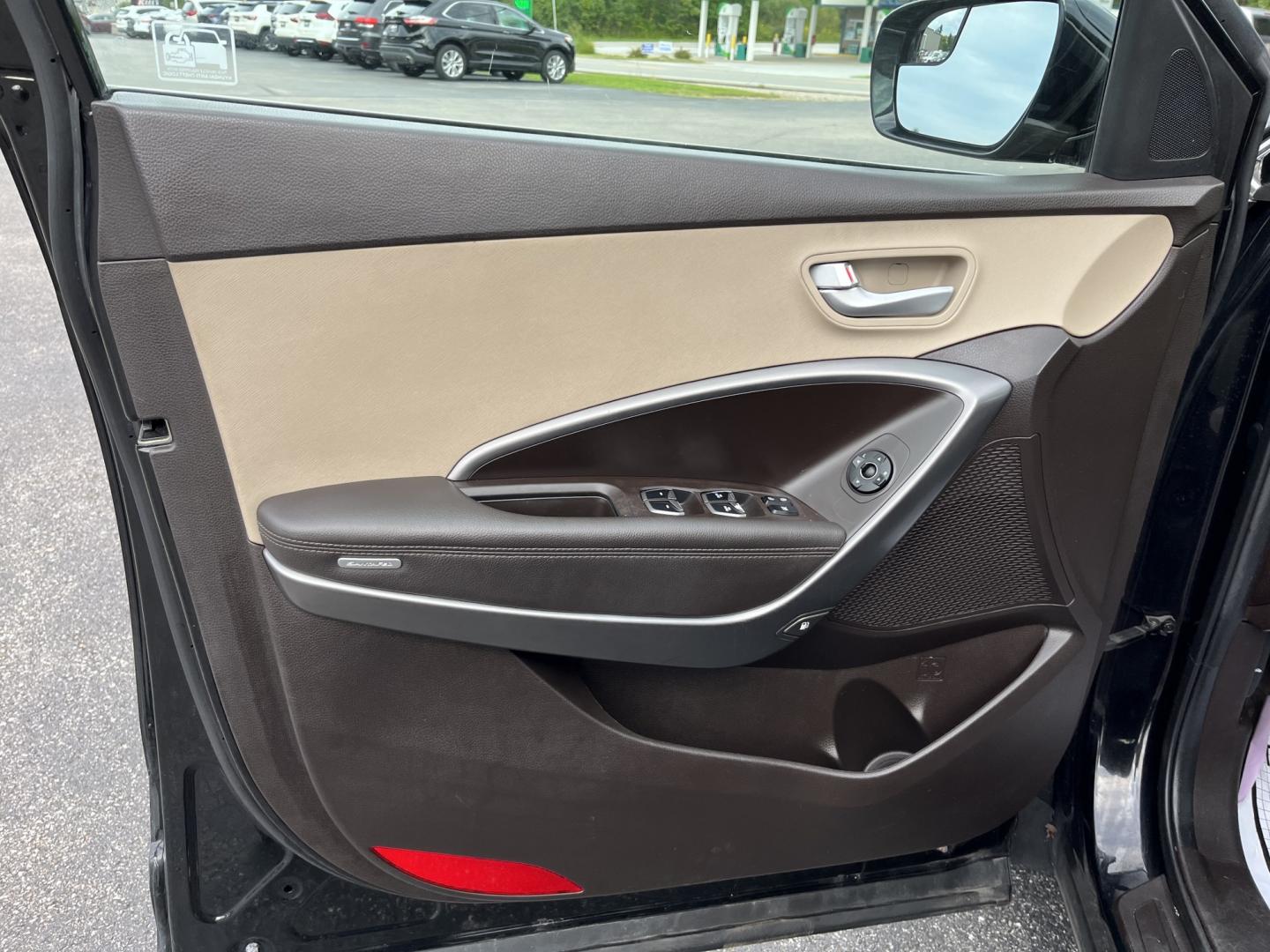 2017 Black /Tan Hyundai Santa Fe Sport 2.4 AWD (5NMZUDLB8HH) with an 2.4L I4 DOHC 16V engine, Automatc transmission, located at 11115 Chardon Rd. , Chardon, OH, 44024, (440) 214-9705, 41.580246, -81.241943 - 2017 Hyundai Santa Fe Sport AWD – Everyday Space with All-Weather Confidence Looking for a midsize SUV that stays useful without becoming complicated? This 2017 Hyundai Santa Fe Sport AWD is built for that kind of driving. The 2.4L GDI engine and 6-speed automatic give you smooth, dependable powe- Photo#15