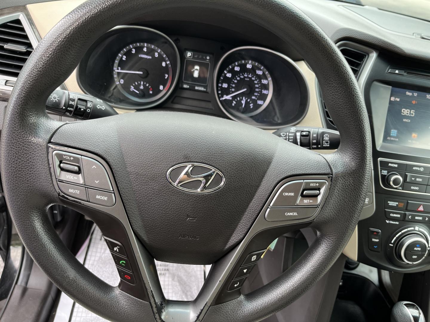 2017 Black /Tan Hyundai Santa Fe Sport 2.4 AWD (5NMZUDLB8HH) with an 2.4L I4 DOHC 16V engine, Automatc transmission, located at 11115 Chardon Rd. , Chardon, OH, 44024, (440) 214-9705, 41.580246, -81.241943 - 2017 Hyundai Santa Fe Sport AWD – Everyday Space with All-Weather Confidence Looking for a midsize SUV that stays useful without becoming complicated? This 2017 Hyundai Santa Fe Sport AWD is built for that kind of driving. The 2.4L GDI engine and 6-speed automatic give you smooth, dependable powe- Photo#18