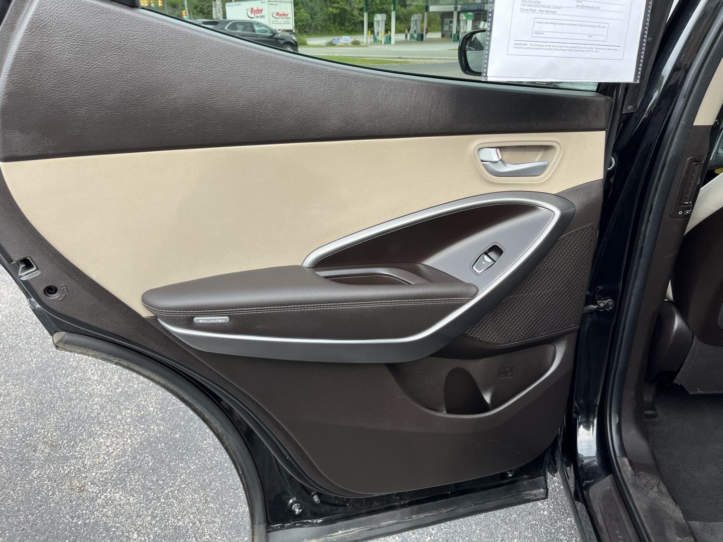 2017 Black /Tan Hyundai Santa Fe Sport 2.4 AWD (5NMZUDLB8HH) with an 2.4L I4 DOHC 16V engine, Automatc transmission, located at 11115 Chardon Rd. , Chardon, OH, 44024, (440) 214-9705, 41.580246, -81.241943 - 2017 Hyundai Santa Fe Sport AWD – Everyday Space with All-Weather Confidence Looking for a midsize SUV that stays useful without becoming complicated? This 2017 Hyundai Santa Fe Sport AWD is built for that kind of driving. The 2.4L GDI engine and 6-speed automatic give you smooth, dependable powe- Photo#28
