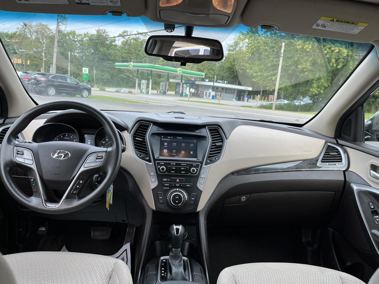 2017 Black /Tan Hyundai Santa Fe Sport 2.4 AWD (5NMZUDLB8HH) with an 2.4L I4 DOHC 16V engine, Automatc transmission, located at 11115 Chardon Rd. , Chardon, OH, 44024, (440) 214-9705, 41.580246, -81.241943 - 2017 Hyundai Santa Fe Sport AWD – Everyday Space with All-Weather Confidence Looking for a midsize SUV that stays useful without becoming complicated? This 2017 Hyundai Santa Fe Sport AWD is built for that kind of driving. The 2.4L GDI engine and 6-speed automatic give you smooth, dependable powe- Photo#30