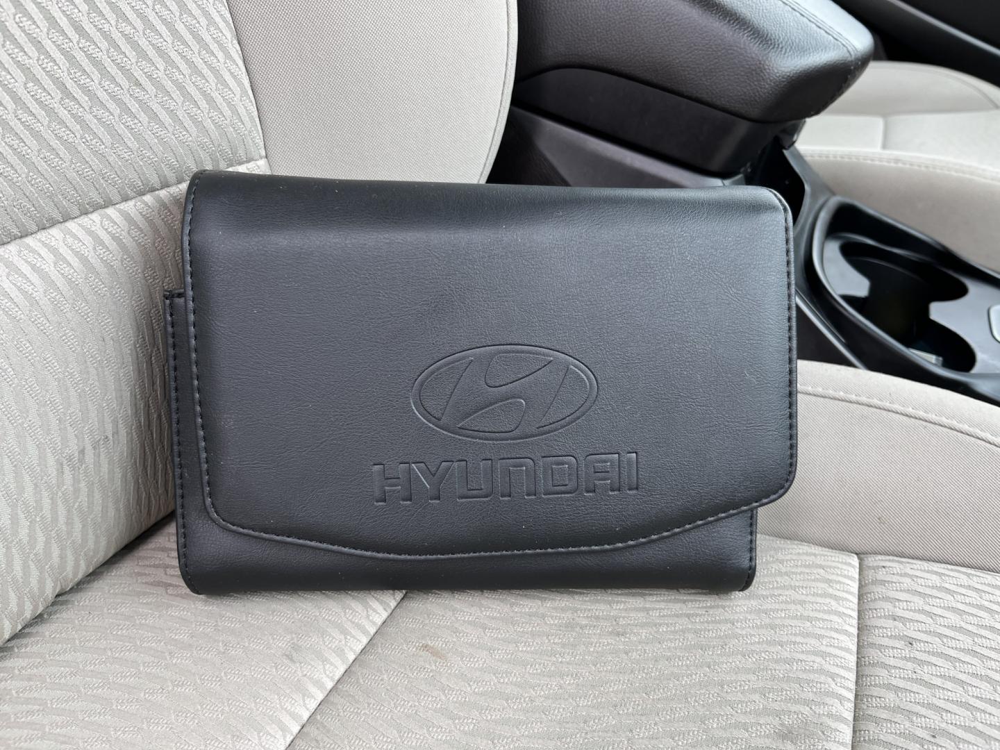 2017 Black /Tan Hyundai Santa Fe Sport 2.4 AWD (5NMZUDLB8HH) with an 2.4L I4 DOHC 16V engine, Automatc transmission, located at 11115 Chardon Rd. , Chardon, OH, 44024, (440) 214-9705, 41.580246, -81.241943 - 2017 Hyundai Santa Fe Sport AWD – Everyday Space with All-Weather Confidence Looking for a midsize SUV that stays useful without becoming complicated? This 2017 Hyundai Santa Fe Sport AWD is built for that kind of driving. The 2.4L GDI engine and 6-speed automatic give you smooth, dependable powe- Photo#36