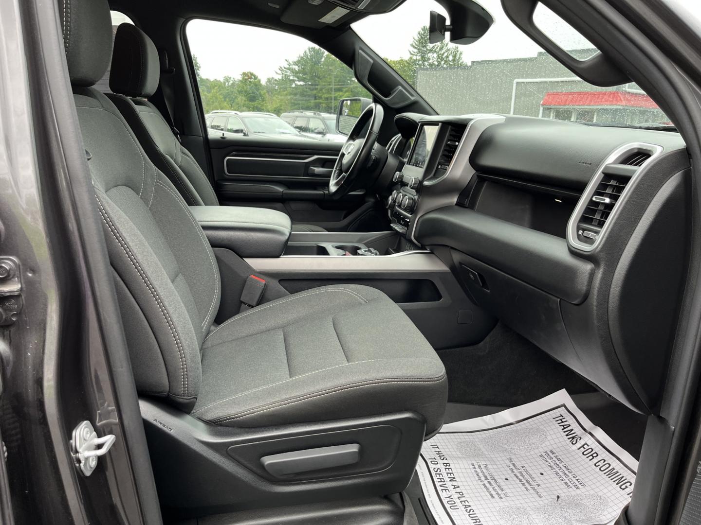 2021 Gray /Black RAM 1500 Big Horn Quad Cab 4WD (1C6SRFBT1MN) with an 5.7L V8 OHV 16V engine, Automatc transmission, located at 11115 Chardon Rd. , Chardon, OH, 44024, (440) 214-9705, 41.580246, -81.241943 - 2021 Ram 1500 Big Horn Quad Cab 4WD – HEMI Strength with Real Towing Capability This is a truck built to earn its keep. The 2021 Ram 1500 Big Horn Quad Cab 4WD pairs the proven 5.7L HEMI V8 with an 8-speed automatic, 3.21 gearing, and on-demand 4WD to deliver a strong 8,310 lb towing capacity. It- Photo#34