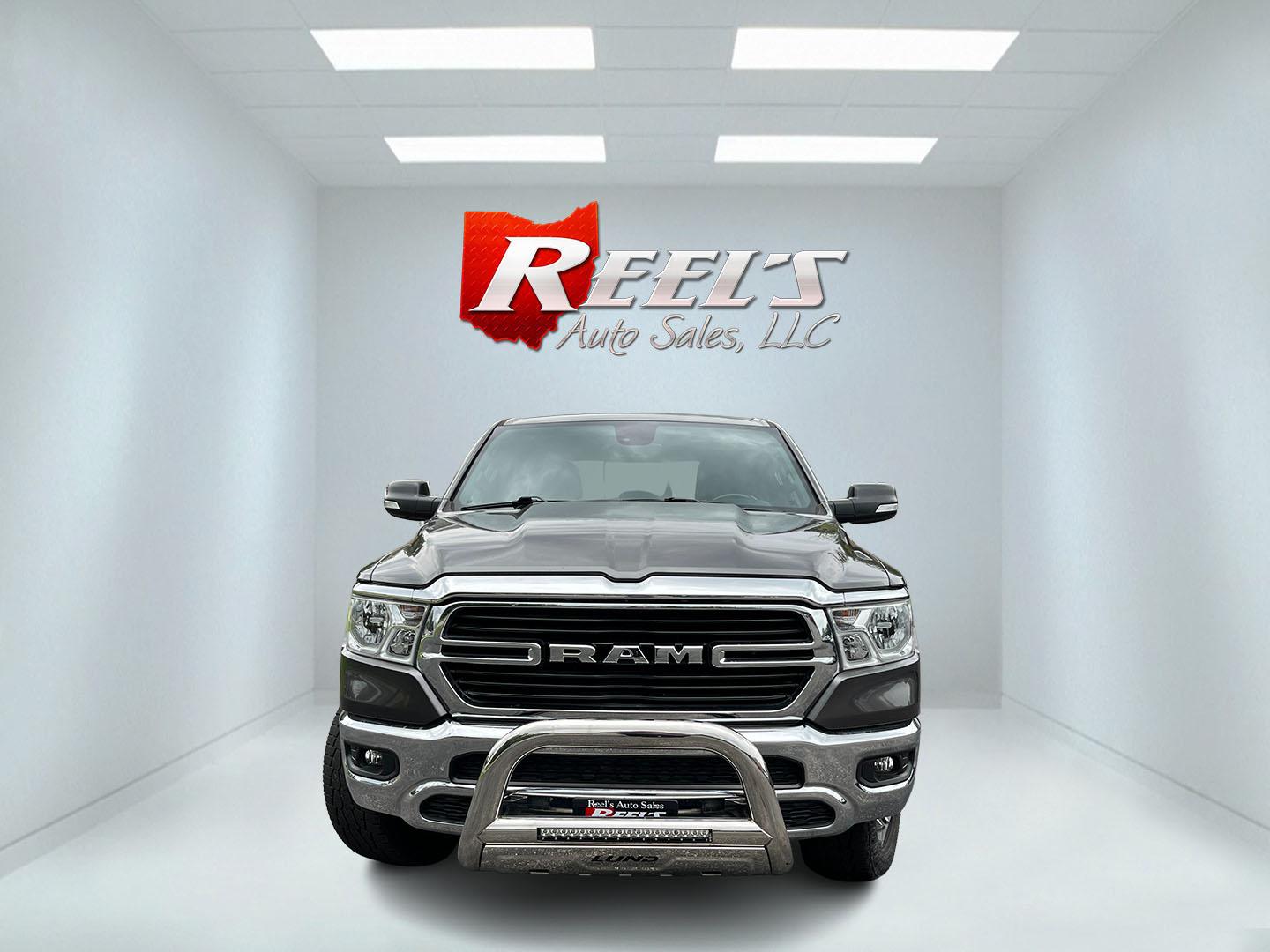2021 Gray /Black RAM 1500 Big Horn Quad Cab 4WD (1C6SRFBT1MN) with an 5.7L V8 OHV 16V engine, Automatc transmission, located at 11115 Chardon Rd. , Chardon, OH, 44024, (440) 214-9705, 41.580246, -81.241943 - 2021 Ram 1500 Big Horn Quad Cab 4WD – HEMI Strength with Real Towing Capability This is a truck built to earn its keep. The 2021 Ram 1500 Big Horn Quad Cab 4WD pairs the proven 5.7L HEMI V8 with an 8-speed automatic, 3.21 gearing, and on-demand 4WD to deliver a strong 8,310 lb towing capacity. It- Photo#1