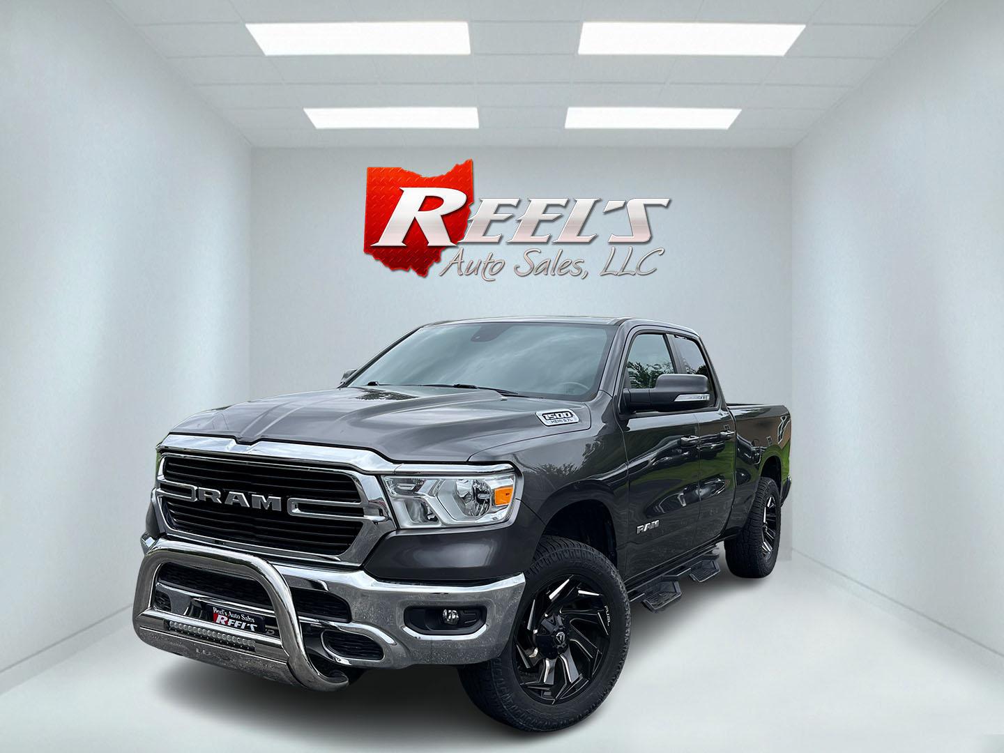 2021 Gray /Black RAM 1500 Big Horn Quad Cab 4WD (1C6SRFBT1MN) with an 5.7L V8 OHV 16V engine, Automatc transmission, located at 11115 Chardon Rd. , Chardon, OH, 44024, (440) 214-9705, 41.580246, -81.241943 - 2021 Ram 1500 Big Horn Quad Cab 4WD – HEMI Strength with Real Towing Capability This is a truck built to earn its keep. The 2021 Ram 1500 Big Horn Quad Cab 4WD pairs the proven 5.7L HEMI V8 with an 8-speed automatic, 3.21 gearing, and on-demand 4WD to deliver a strong 8,310 lb towing capacity. It- Photo#0