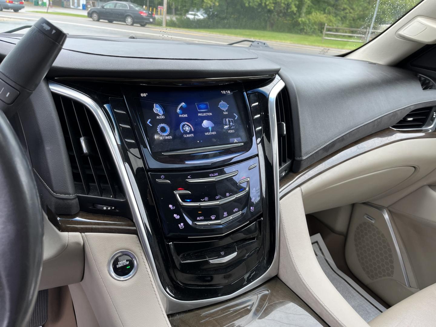 2020 White /White Cadillac Escalade Premium Luxury 4WD (1GYS4CKJ3LR) with an 6.2L V8 OHV 16V engine, Automatc transmission, located at 11115 Chardon Rd. , Chardon, OH, 44024, (440) 214-9705, 41.580246, -81.241943 - 2020 Cadillac Escalade Premium Luxury 4WD – Flagship Presence with Quiet Confidence Some SUVs are bought for space. This one is bought because it makes an impression the moment it arrives. The 2020 Cadillac Escalade Premium Luxury 4WD carries the kind of presence that still turns heads — long,- Photo#24