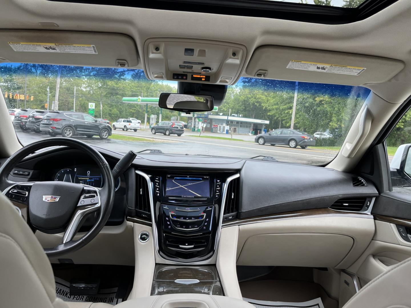 2020 White /White Cadillac Escalade Premium Luxury 4WD (1GYS4CKJ3LR) with an 6.2L V8 OHV 16V engine, Automatc transmission, located at 11115 Chardon Rd. , Chardon, OH, 44024, (440) 214-9705, 41.580246, -81.241943 - 2020 Cadillac Escalade Premium Luxury 4WD – Flagship Presence with Quiet Confidence Some SUVs are bought for space. This one is bought because it makes an impression the moment it arrives. The 2020 Cadillac Escalade Premium Luxury 4WD carries the kind of presence that still turns heads — long,- Photo#31