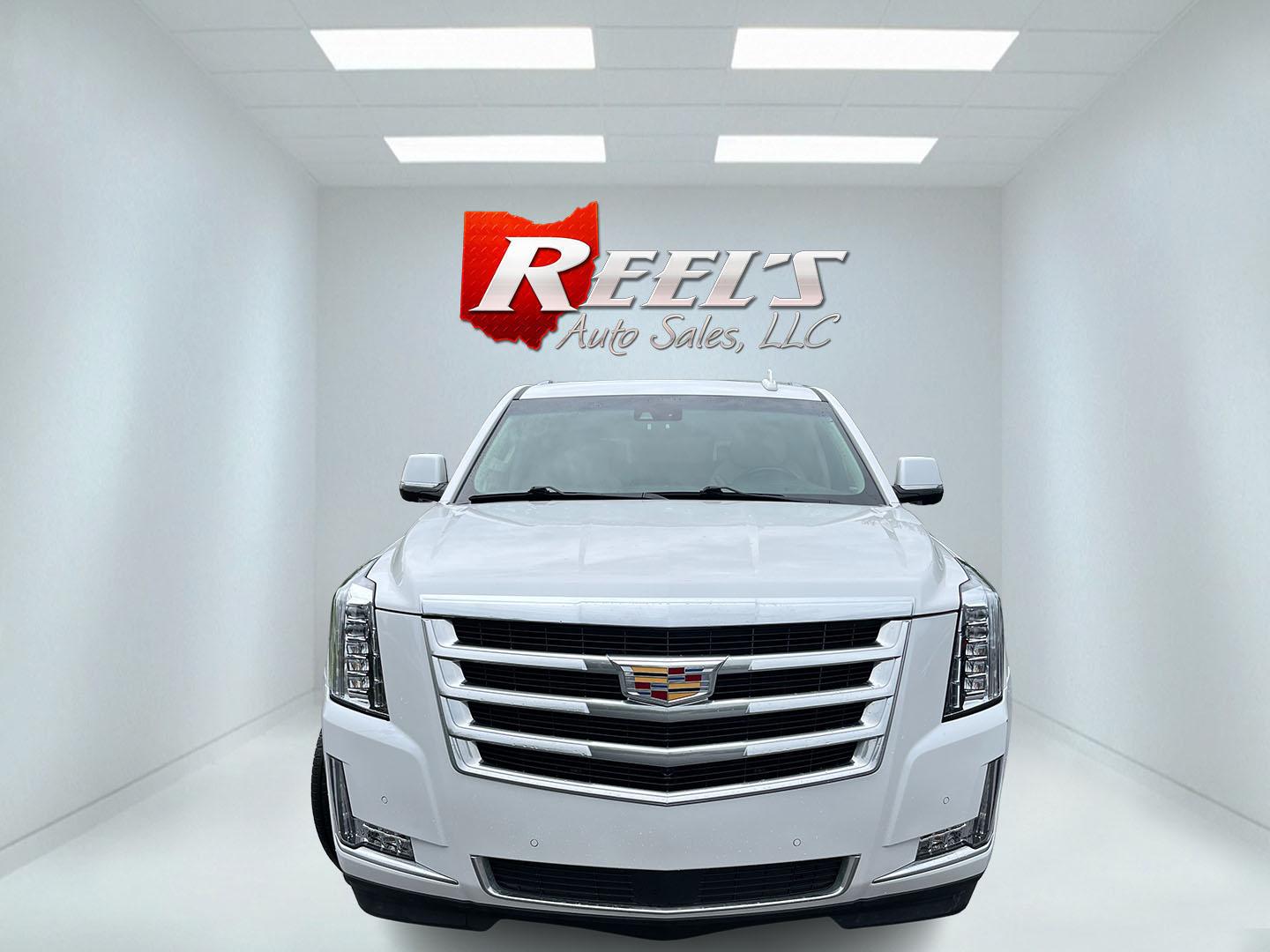 2020 White /White Cadillac Escalade Premium Luxury 4WD (1GYS4CKJ3LR) with an 6.2L V8 OHV 16V engine, Automatc transmission, located at 11115 Chardon Rd. , Chardon, OH, 44024, (440) 214-9705, 41.580246, -81.241943 - 2020 Cadillac Escalade Premium Luxury 4WD – Flagship Presence with Quiet Confidence Some SUVs are bought for space. This one is bought because it makes an impression the moment it arrives. The 2020 Cadillac Escalade Premium Luxury 4WD carries the kind of presence that still turns heads — long,- Photo#1