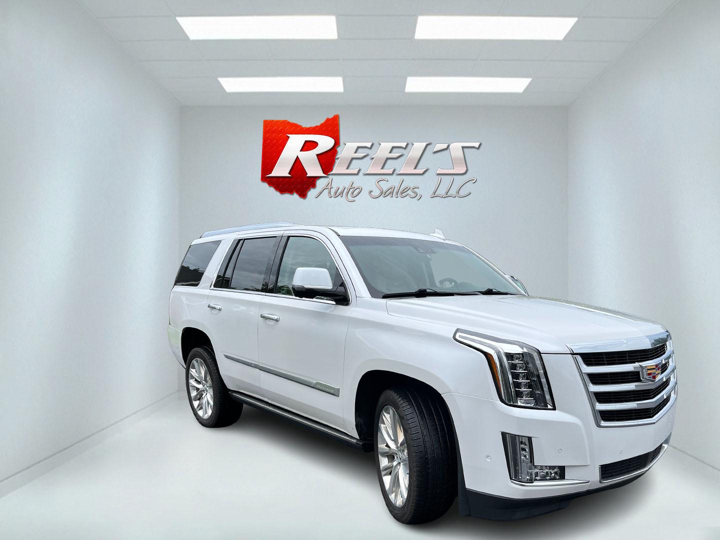 2020 White /White Cadillac Escalade Premium Luxury 4WD (1GYS4CKJ3LR) with an 6.2L V8 OHV 16V engine, Automatc transmission, located at 11115 Chardon Rd. , Chardon, OH, 44024, (440) 214-9705, 41.580246, -81.241943 - 2020 Cadillac Escalade Premium Luxury 4WD – Flagship Presence with Quiet Confidence Some SUVs are bought for space. This one is bought because it makes an impression the moment it arrives. The 2020 Cadillac Escalade Premium Luxury 4WD carries the kind of presence that still turns heads — long,- Photo#2