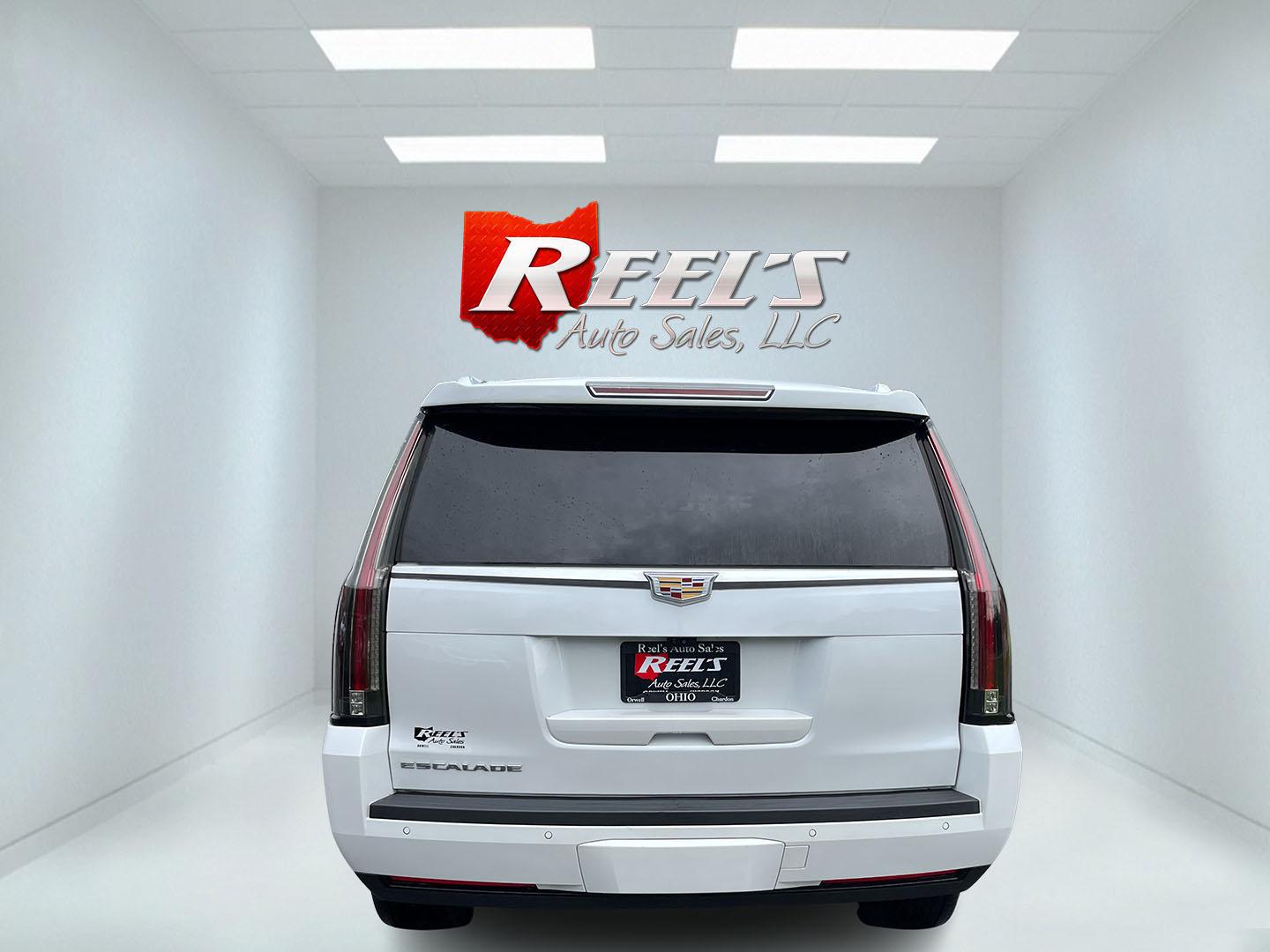 2020 White /White Cadillac Escalade Premium Luxury 4WD (1GYS4CKJ3LR) with an 6.2L V8 OHV 16V engine, Automatc transmission, located at 11115 Chardon Rd. , Chardon, OH, 44024, (440) 214-9705, 41.580246, -81.241943 - 2020 Cadillac Escalade Premium Luxury 4WD – Flagship Presence with Quiet Confidence Some SUVs are bought for space. This one is bought because it makes an impression the moment it arrives. The 2020 Cadillac Escalade Premium Luxury 4WD carries the kind of presence that still turns heads — long,- Photo#8