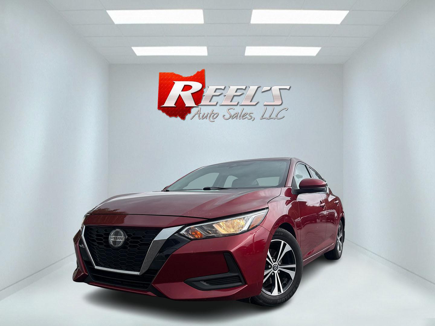 2020 Red /Black Nissan Sentra SV (3N1AB8CV2LY) with an 2.0L I4 SFI DOHC 16V engine, Automatic transmission, located at 11115 Chardon Rd. , Chardon, OH, 44024, (440) 214-9705, 41.580246, -81.241943 - 2020 Nissan Sentra SV – Efficient Daily Driver with Modern Safety and One-Owner History If you want a compact sedan that is easy on fuel and easy to live with, this 2020 Nissan Sentra SV is a strong option. The 2.0L engine delivers a standout 39 MPG highway and 33 MPG combined, while ECO Mode and- Photo#0