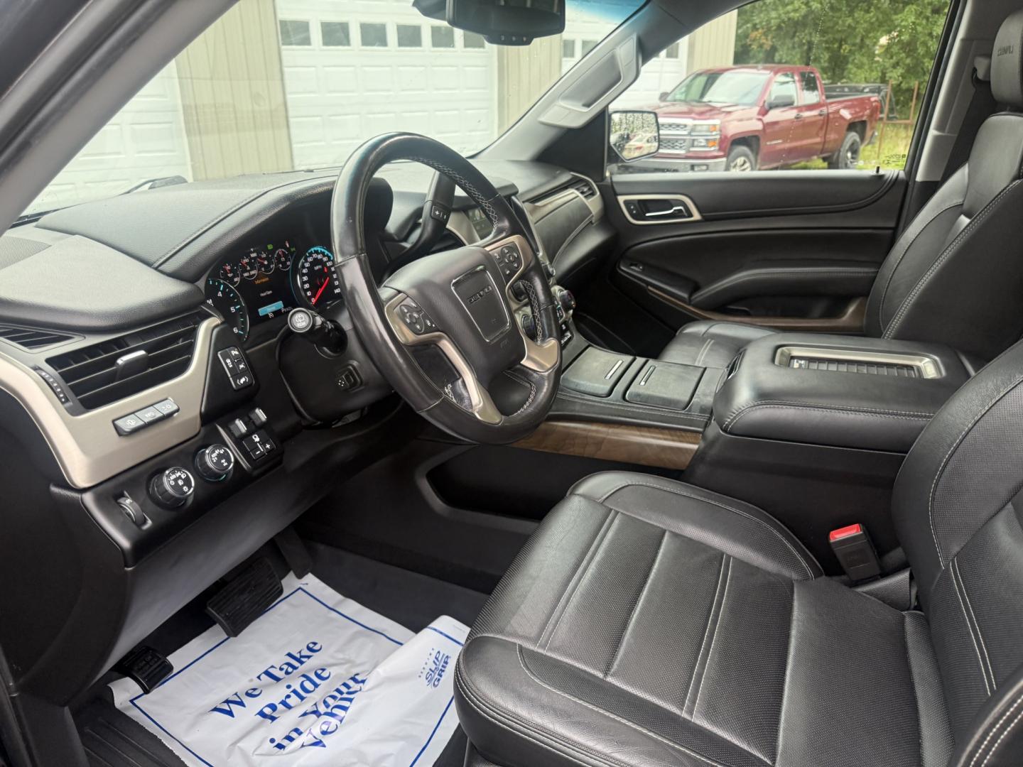 2018 Black /Black GMC Yukon Denali 4WD (1GKS2CKJ0JR) with an 6.2L V8 OHV 16V engine, Automatic transmission, located at 547 E. Main St., Orwell, OH, 44076, (440) 437-5893, 41.535435, -80.847855 - 2018 GMC Yukon Denali 4WD – Flagship Family Luxury with Serious V8 Capability The Denali name means this Yukon sits at the top of the lineup, and this 2018 4WD wears that prestige well. Finished in Black, it has the dark, commanding presence families want when they are stepping up to a full-size- Photo#8
