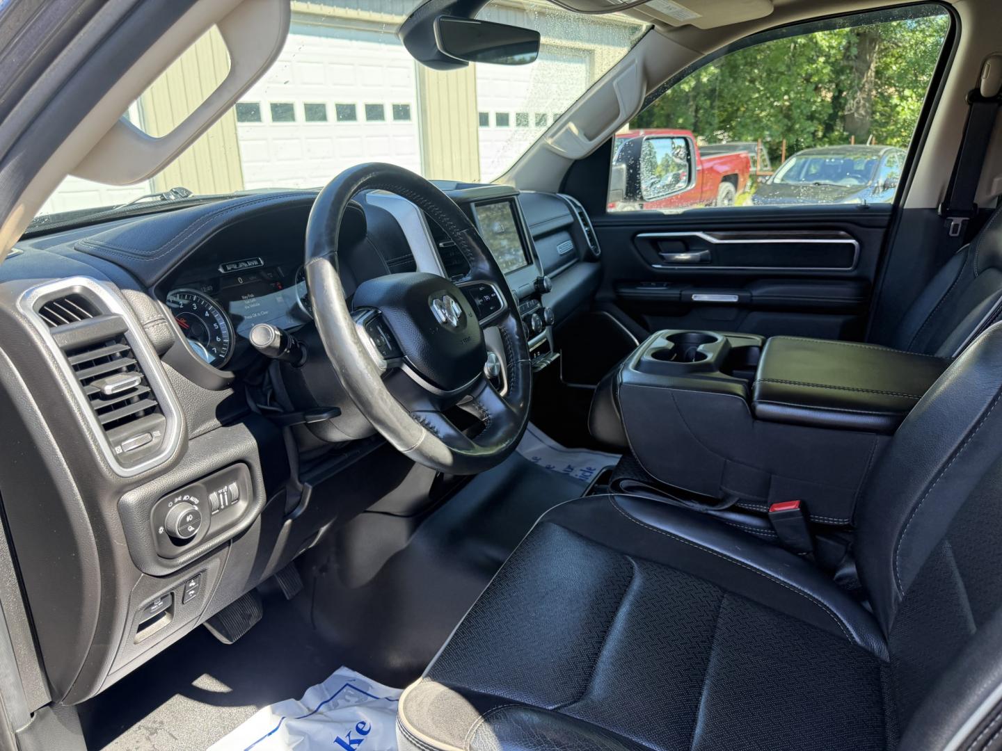 2019 Gray /Black RAM 1500 Laramie Crew Cab SWB 4WD (1C6SRFJT8KN) with an 5.7L V8 OHV 16V engine, Automatic transmission, located at 547 E. Main St., Orwell, OH, 44076, (440) 437-5893, 41.535435, -80.847855 - 2019 Ram 1500 Laramie Crew Cab 4WD – HEMI Power with Laramie Comfort and Presence The Laramie trim is where the Ram 1500 starts to feel more upscale, and this 2019 Crew Cab 4WD shows why. Finished in Granite Crystal Metallic with 20" polished aluminum wheels and full LED exterior lighting, it has- Photo#14