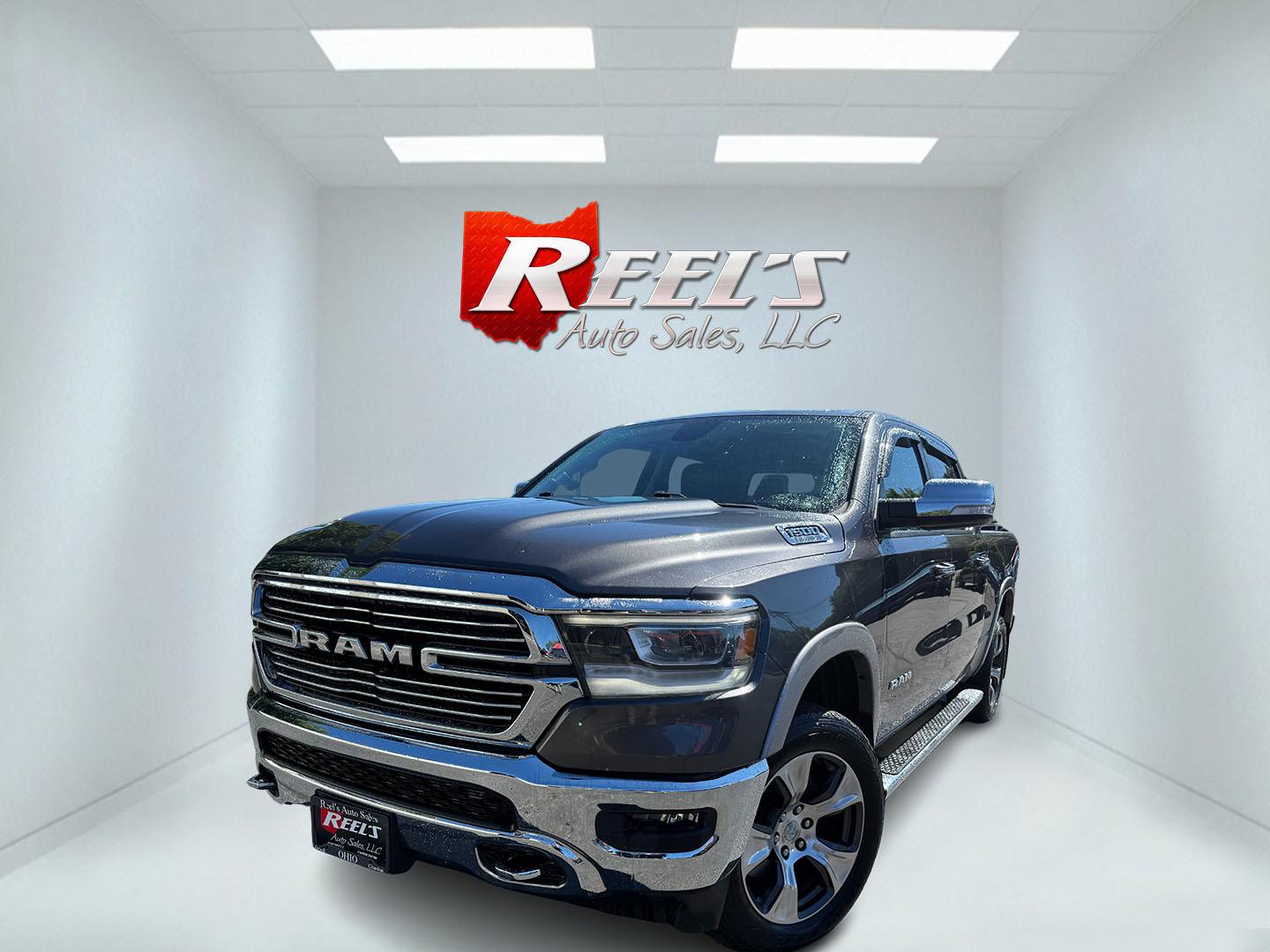 2019 Gray /Black RAM 1500 Laramie Crew Cab SWB 4WD (1C6SRFJT8KN) with an 5.7L V8 OHV 16V engine, Automatic transmission, located at 547 E. Main St., Orwell, OH, 44076, (440) 437-5893, 41.535435, -80.847855 - 2019 Ram 1500 Laramie Crew Cab 4WD – HEMI Power with Laramie Comfort and Presence The Laramie trim is where the Ram 1500 starts to feel more upscale, and this 2019 Crew Cab 4WD shows why. Finished in Granite Crystal Metallic with 20" polished aluminum wheels and full LED exterior lighting, it has- Photo#0