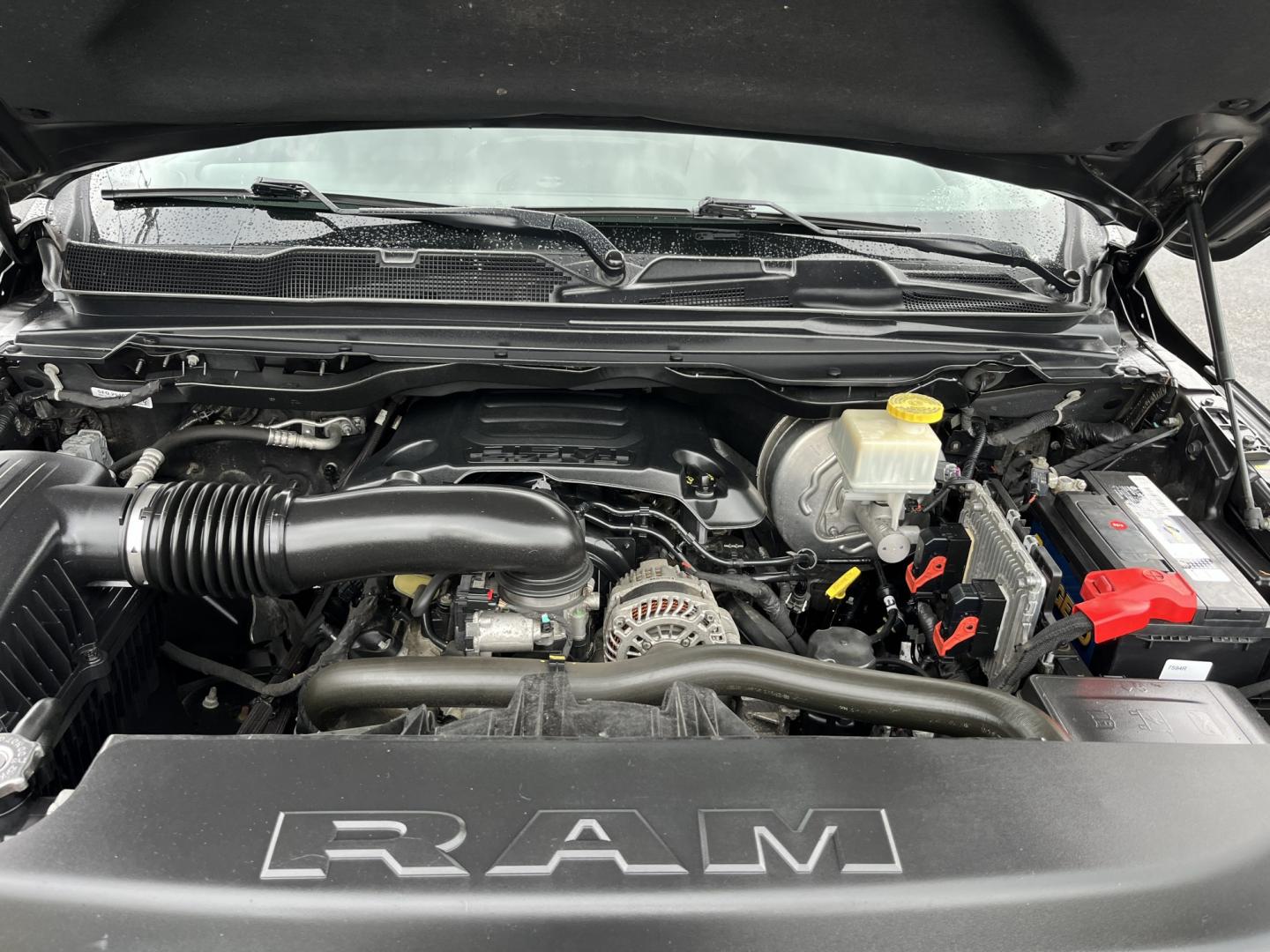 2022 Gray /Black RAM 1500 Big Horn Quad Cab 4WD (1C6SRFBT3NN) with an 5.7L V8 OHV 16V engine, Automatc transmission, located at 547 E. Main St., Orwell, OH, 44076, (440) 437-5893, 41.535435, -80.847855 - 2022 Ram 1500 Big Horn Quad Cab 4WD – HEMI Strength with Sport Style and Serious Towing Capability This 2022 Ram 1500 Big Horn Quad Cab 4WD is a strong, well-equipped pickup for drivers who want V8 power and a sharper look. The Sport Appearance Package, 20" chrome wheels, and Granite Crystal Meta- Photo#13