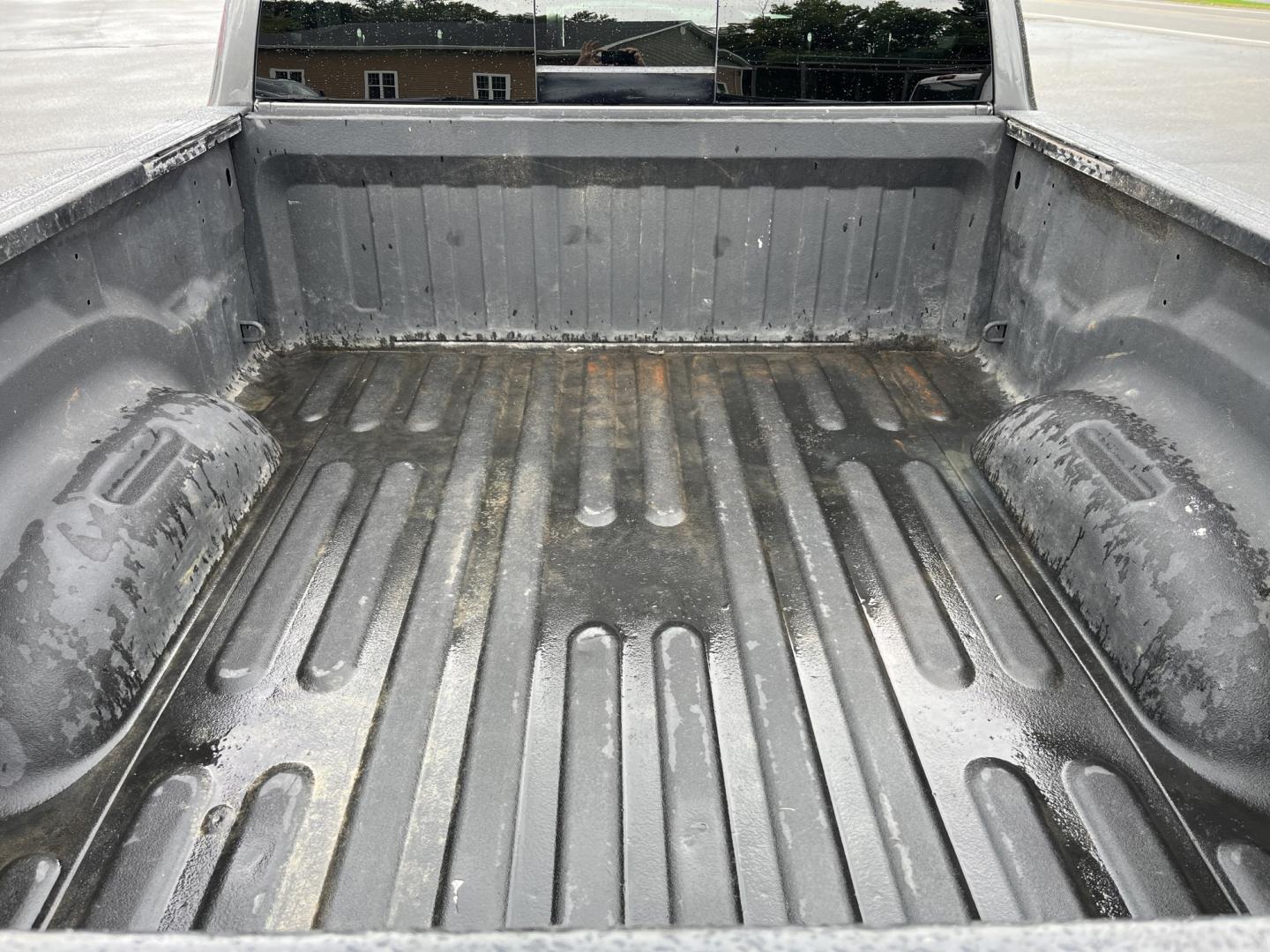 2022 Gray /Black RAM 1500 Big Horn Quad Cab 4WD (1C6SRFBT3NN) with an 5.7L V8 OHV 16V engine, Automatc transmission, located at 547 E. Main St., Orwell, OH, 44076, (440) 437-5893, 41.535435, -80.847855 - 2022 Ram 1500 Big Horn Quad Cab 4WD – HEMI Strength with Sport Style and Serious Towing Capability This 2022 Ram 1500 Big Horn Quad Cab 4WD is a strong, well-equipped pickup for drivers who want V8 power and a sharper look. The Sport Appearance Package, 20" chrome wheels, and Granite Crystal Meta- Photo#14