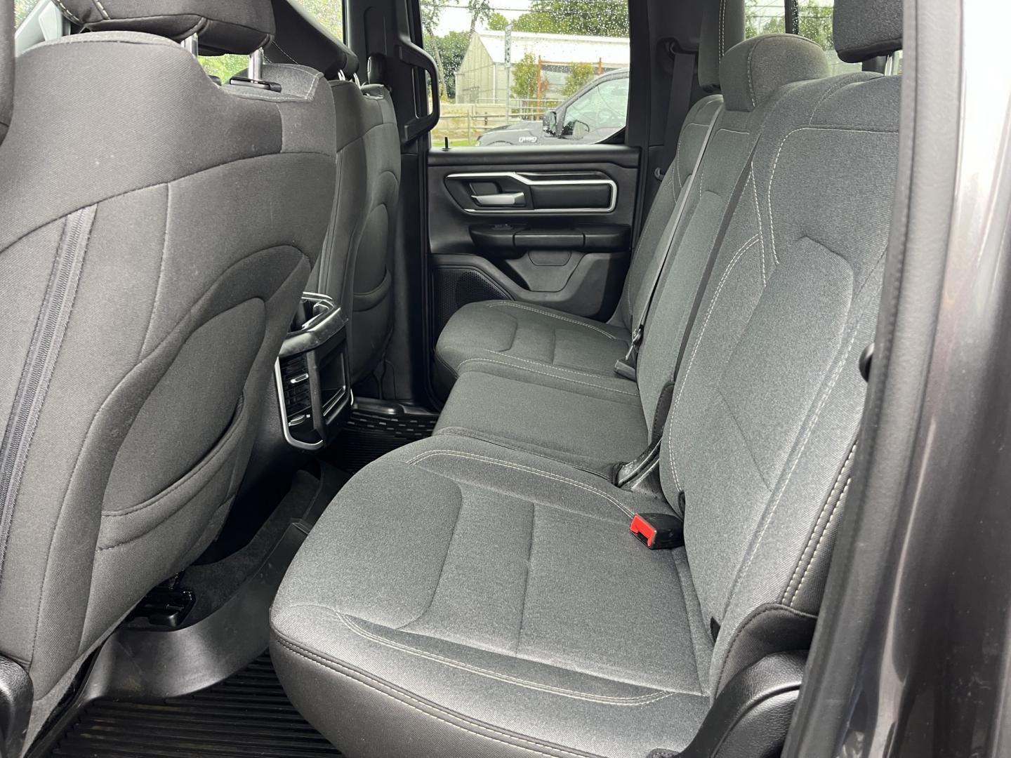2022 Gray /Black RAM 1500 Big Horn Quad Cab 4WD (1C6SRFBT3NN) with an 5.7L V8 OHV 16V engine, Automatc transmission, located at 547 E. Main St., Orwell, OH, 44076, (440) 437-5893, 41.535435, -80.847855 - 2022 Ram 1500 Big Horn Quad Cab 4WD – HEMI Strength with Sport Style and Serious Towing Capability This 2022 Ram 1500 Big Horn Quad Cab 4WD is a strong, well-equipped pickup for drivers who want V8 power and a sharper look. The Sport Appearance Package, 20" chrome wheels, and Granite Crystal Meta- Photo#29