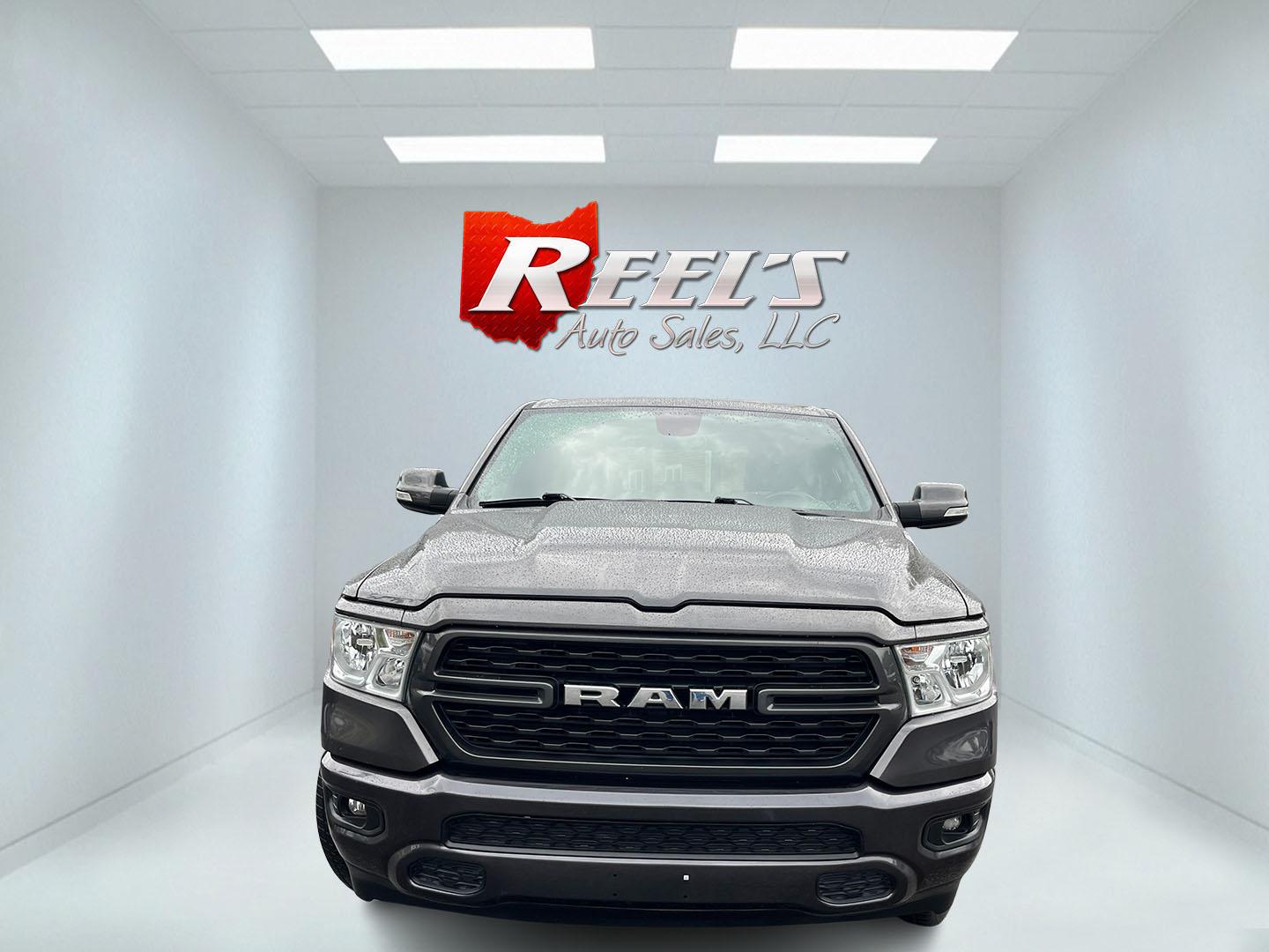 2022 Gray /Black RAM 1500 Big Horn Quad Cab 4WD (1C6SRFBT3NN) with an 5.7L V8 OHV 16V engine, Automatc transmission, located at 547 E. Main St., Orwell, OH, 44076, (440) 437-5893, 41.535435, -80.847855 - 2022 Ram 1500 Big Horn Quad Cab 4WD – HEMI Strength with Sport Style and Serious Towing Capability This 2022 Ram 1500 Big Horn Quad Cab 4WD is a strong, well-equipped pickup for drivers who want V8 power and a sharper look. The Sport Appearance Package, 20" chrome wheels, and Granite Crystal Meta- Photo#1