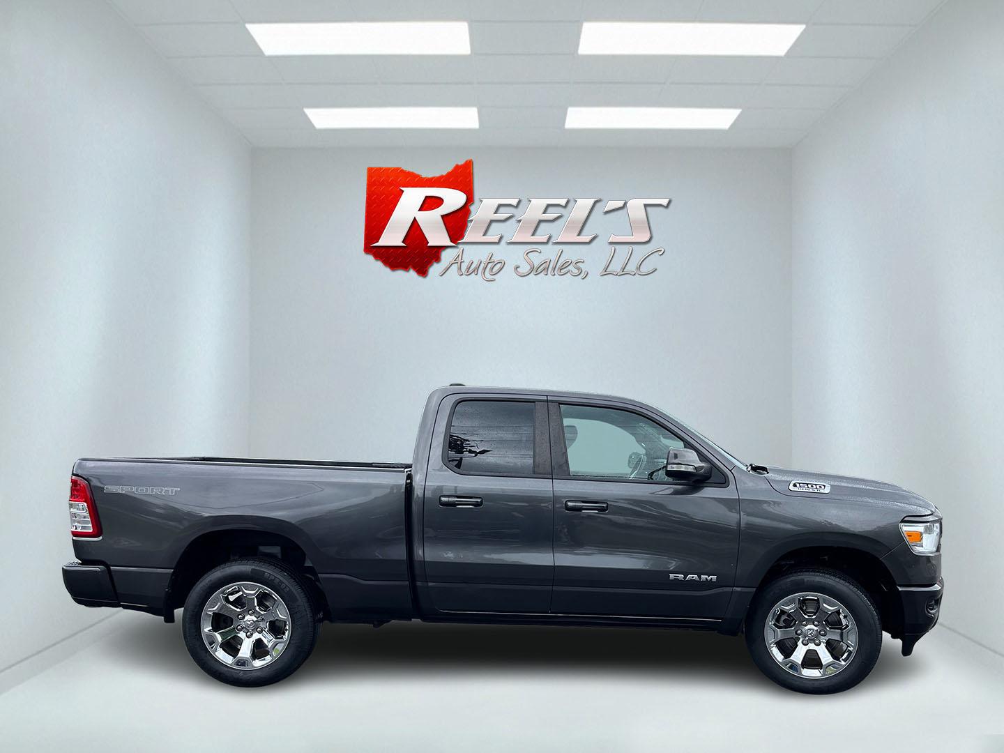 2022 Gray /Black RAM 1500 Big Horn Quad Cab 4WD (1C6SRFBT3NN) with an 5.7L V8 OHV 16V engine, Automatc transmission, located at 547 E. Main St., Orwell, OH, 44076, (440) 437-5893, 41.535435, -80.847855 - 2022 Ram 1500 Big Horn Quad Cab 4WD – HEMI Strength with Sport Style and Serious Towing Capability This 2022 Ram 1500 Big Horn Quad Cab 4WD is a strong, well-equipped pickup for drivers who want V8 power and a sharper look. The Sport Appearance Package, 20" chrome wheels, and Granite Crystal Meta- Photo#5