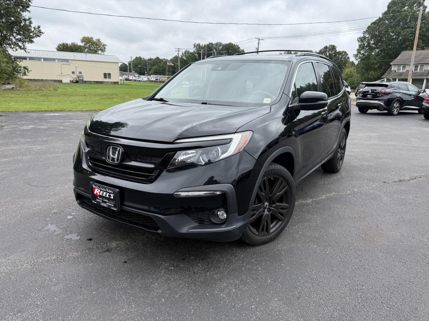 2022 Black /Black Honda Pilot SE 4WD (5FNYF6H21NB) with an 3.5L V6 SOHC 24V engine, Automatic transmission, located at 547 E. Main St., Orwell, OH, 44076, (440) 437-5893, 41.535435, -80.847855 - 2022 Honda Pilot SE AWD – Family-Ready Three-Row Honda with Comfort and Confidence If you need room for the family and the peace of mind of Honda reliability, this 2022 Honda Pilot SE AWD is a strong choice. Finished in Crystal Black Pearl and riding on 20" black alloy wheels, with LED daytime ru- Photo#0