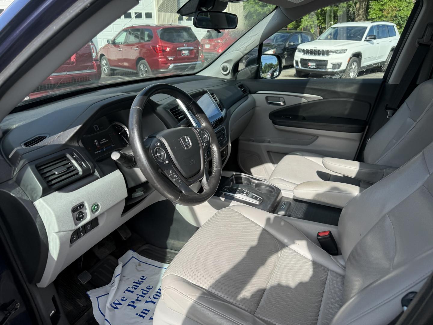 2020 Blue /Gray Honda Ridgeline RTL AWD (5FPYK3F51LB) with an 3.5L V6 SOHC 24V engine, Automatic transmission, located at 11115 Chardon Rd. , Chardon, OH, 44024, (440) 214-9705, 41.580246, -81.241943 - 2020 Honda Ridgeline RTL AWD – Unique Honda Pickup Comfort with Everyday Capability The Ridgeline is Honda’s take on a pickup — more comfortable and car-like than a traditional truck, but still useful when you need a bed and towing. This 2020 RTL AWD is a strong example. Finished in Obsidian- Photo#5