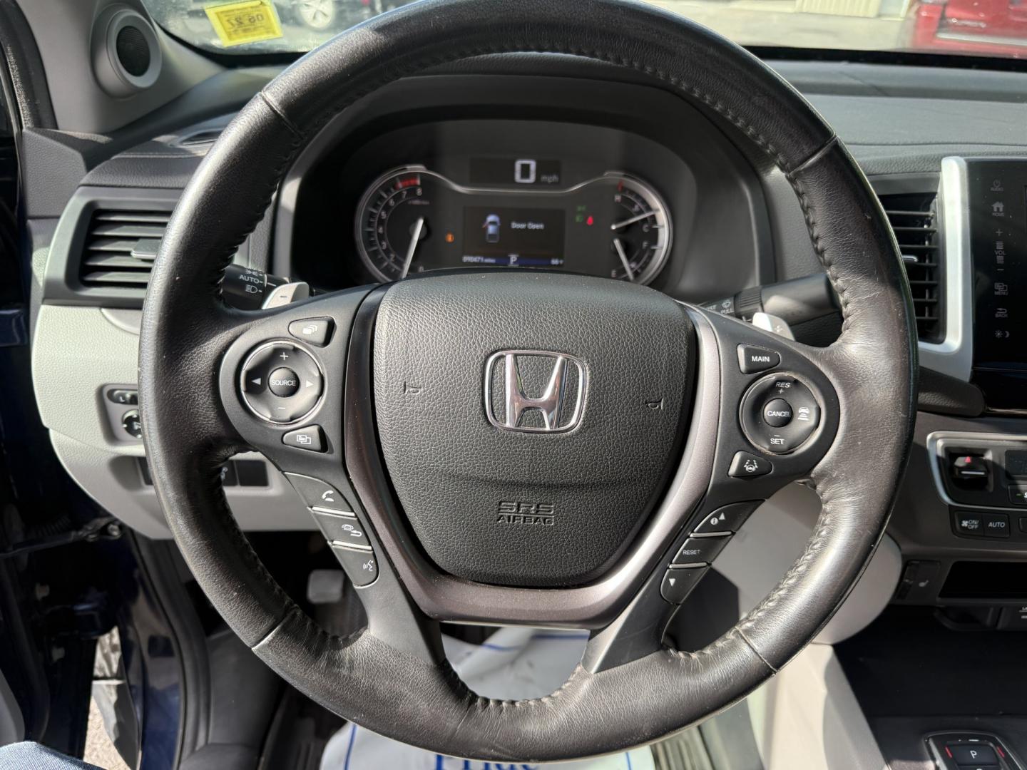2020 Blue /Gray Honda Ridgeline RTL AWD (5FPYK3F51LB) with an 3.5L V6 SOHC 24V engine, Automatic transmission, located at 11115 Chardon Rd. , Chardon, OH, 44024, (440) 214-9705, 41.580246, -81.241943 - 2020 Honda Ridgeline RTL AWD – Unique Honda Pickup Comfort with Everyday Capability The Ridgeline is Honda’s take on a pickup — more comfortable and car-like than a traditional truck, but still useful when you need a bed and towing. This 2020 RTL AWD is a strong example. Finished in Obsidian- Photo#11