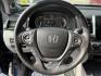 2020 Blue /Gray Honda Ridgeline RTL AWD (5FPYK3F51LB) with an 3.5L V6 SOHC 24V engine, Automatic transmission, located at 11115 Chardon Rd. , Chardon, OH, 44024, (440) 214-9705, 41.580246, -81.241943 - 2020 Honda Ridgeline RTL AWD – Unique Honda Pickup Comfort with Everyday Capability The Ridgeline is Honda’s take on a pickup — more comfortable and car-like than a traditional truck, but still useful when you need a bed and towing. This 2020 RTL AWD is a strong example. Finished in Obsidian- Photo#11