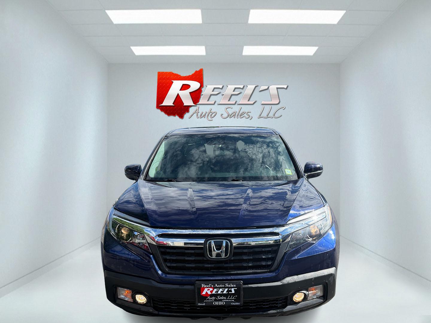 2020 Blue /Gray Honda Ridgeline RTL AWD (5FPYK3F51LB) with an 3.5L V6 SOHC 24V engine, Automatic transmission, located at 11115 Chardon Rd. , Chardon, OH, 44024, (440) 214-9705, 41.580246, -81.241943 - 2020 Honda Ridgeline RTL AWD – Unique Honda Pickup Comfort with Everyday Capability The Ridgeline is Honda’s take on a pickup — more comfortable and car-like than a traditional truck, but still useful when you need a bed and towing. This 2020 RTL AWD is a strong example. Finished in Obsidian- Photo#1