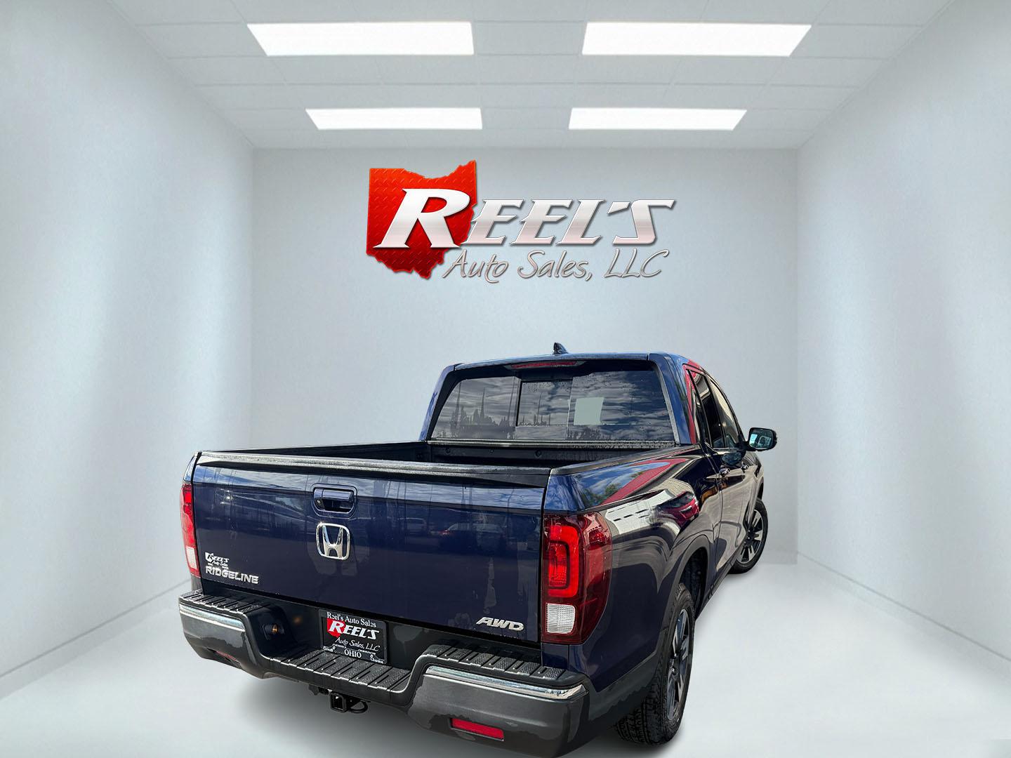 2020 Blue /Gray Honda Ridgeline RTL AWD (5FPYK3F51LB) with an 3.5L V6 SOHC 24V engine, Automatic transmission, located at 11115 Chardon Rd. , Chardon, OH, 44024, (440) 214-9705, 41.580246, -81.241943 - 2020 Honda Ridgeline RTL AWD – Unique Honda Pickup Comfort with Everyday Capability The Ridgeline is Honda’s take on a pickup — more comfortable and car-like than a traditional truck, but still useful when you need a bed and towing. This 2020 RTL AWD is a strong example. Finished in Obsidian- Photo#21