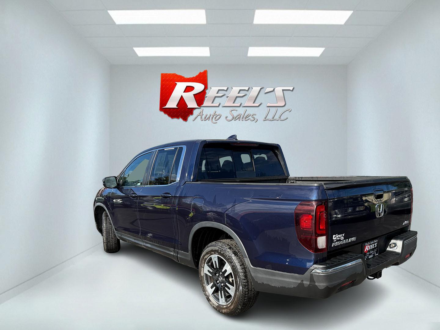 2020 Blue /Gray Honda Ridgeline RTL AWD (5FPYK3F51LB) with an 3.5L V6 SOHC 24V engine, Automatic transmission, located at 11115 Chardon Rd. , Chardon, OH, 44024, (440) 214-9705, 41.580246, -81.241943 - 2020 Honda Ridgeline RTL AWD – Unique Honda Pickup Comfort with Everyday Capability The Ridgeline is Honda’s take on a pickup — more comfortable and car-like than a traditional truck, but still useful when you need a bed and towing. This 2020 RTL AWD is a strong example. Finished in Obsidian- Photo#24