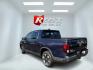 2020 Blue /Gray Honda Ridgeline RTL AWD (5FPYK3F51LB) with an 3.5L V6 SOHC 24V engine, Automatic transmission, located at 11115 Chardon Rd. , Chardon, OH, 44024, (440) 214-9705, 41.580246, -81.241943 - 2020 Honda Ridgeline RTL AWD – Unique Honda Pickup Comfort with Everyday Capability The Ridgeline is Honda’s take on a pickup — more comfortable and car-like than a traditional truck, but still useful when you need a bed and towing. This 2020 RTL AWD is a strong example. Finished in Obsidian- Photo#24
