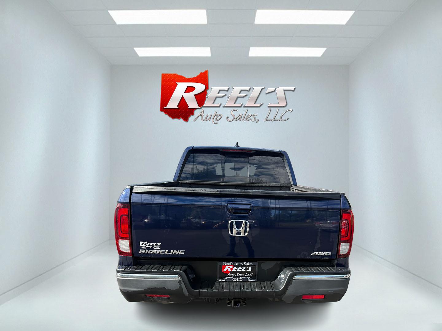 2020 Blue /Gray Honda Ridgeline RTL AWD (5FPYK3F51LB) with an 3.5L V6 SOHC 24V engine, Automatic transmission, located at 11115 Chardon Rd. , Chardon, OH, 44024, (440) 214-9705, 41.580246, -81.241943 - 2020 Honda Ridgeline RTL AWD – Unique Honda Pickup Comfort with Everyday Capability The Ridgeline is Honda’s take on a pickup — more comfortable and car-like than a traditional truck, but still useful when you need a bed and towing. This 2020 RTL AWD is a strong example. Finished in Obsidian- Photo#22