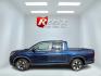 2020 Blue /Gray Honda Ridgeline RTL AWD (5FPYK3F51LB) with an 3.5L V6 SOHC 24V engine, Automatic transmission, located at 11115 Chardon Rd. , Chardon, OH, 44024, (440) 214-9705, 41.580246, -81.241943 - 2020 Honda Ridgeline RTL AWD – Unique Honda Pickup Comfort with Everyday Capability The Ridgeline is Honda’s take on a pickup — more comfortable and car-like than a traditional truck, but still useful when you need a bed and towing. This 2020 RTL AWD is a strong example. Finished in Obsidian- Photo#27