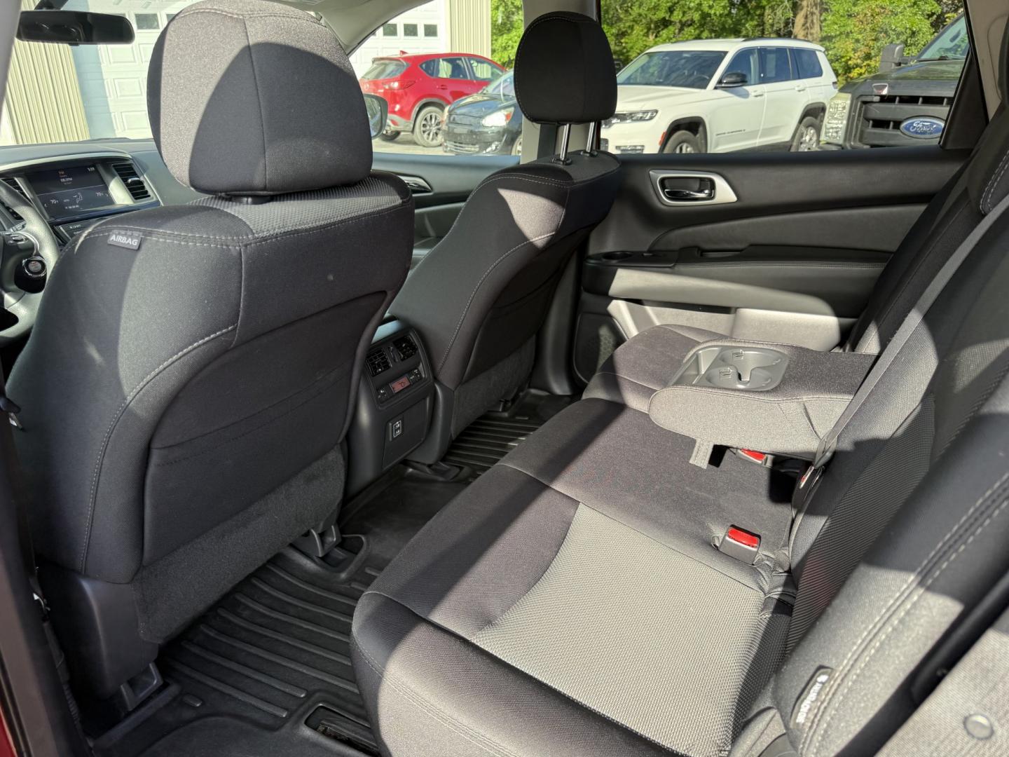 2018 Red /Black Nissan Pathfinder S 4WD (5N1DR2MM8JC) with an 3.5L V6 DOHC 24V engine, Automatic transmission, located at 547 E. Main St., Orwell, OH, 44076, (440) 437-5893, 41.535435, -80.847855 - 2018 Nissan Pathfinder S 4WD – Room for Seven with Fresh Brakes and One-Owner History If you need a three-row SUV that can take the whole family, this 2018 Nissan Pathfinder S 4WD is a practical choice. With room for seven, it is built for school runs, weekend trips, and everyday family life. The- Photo#17