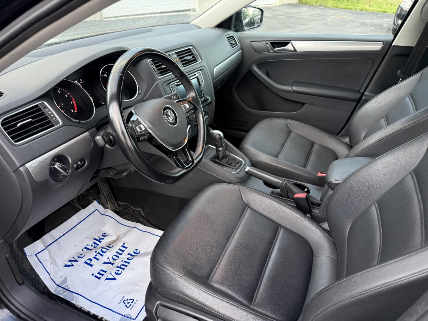 2017 Black /Black Volkswagen Jetta 1.4T SE 6A (3VWDB7AJXHM) with an 1.4L I4 DOHC 20V Turbo engine, Automatic transmission, located at 547 E. Main St., Orwell, OH, 44076, (440) 437-5893, 41.535435, -80.847855 - 2017 Volkswagen Jetta SE – Efficient German Sedan Comfort with Everyday Convenience If you want a compact sedan that feels a little more refined than a basic commuter car, this 2017 Volkswagen Jetta SE is a strong option. The 1.4L Turbocharged engine and 6-speed automatic deliver smooth everyday- Photo#7