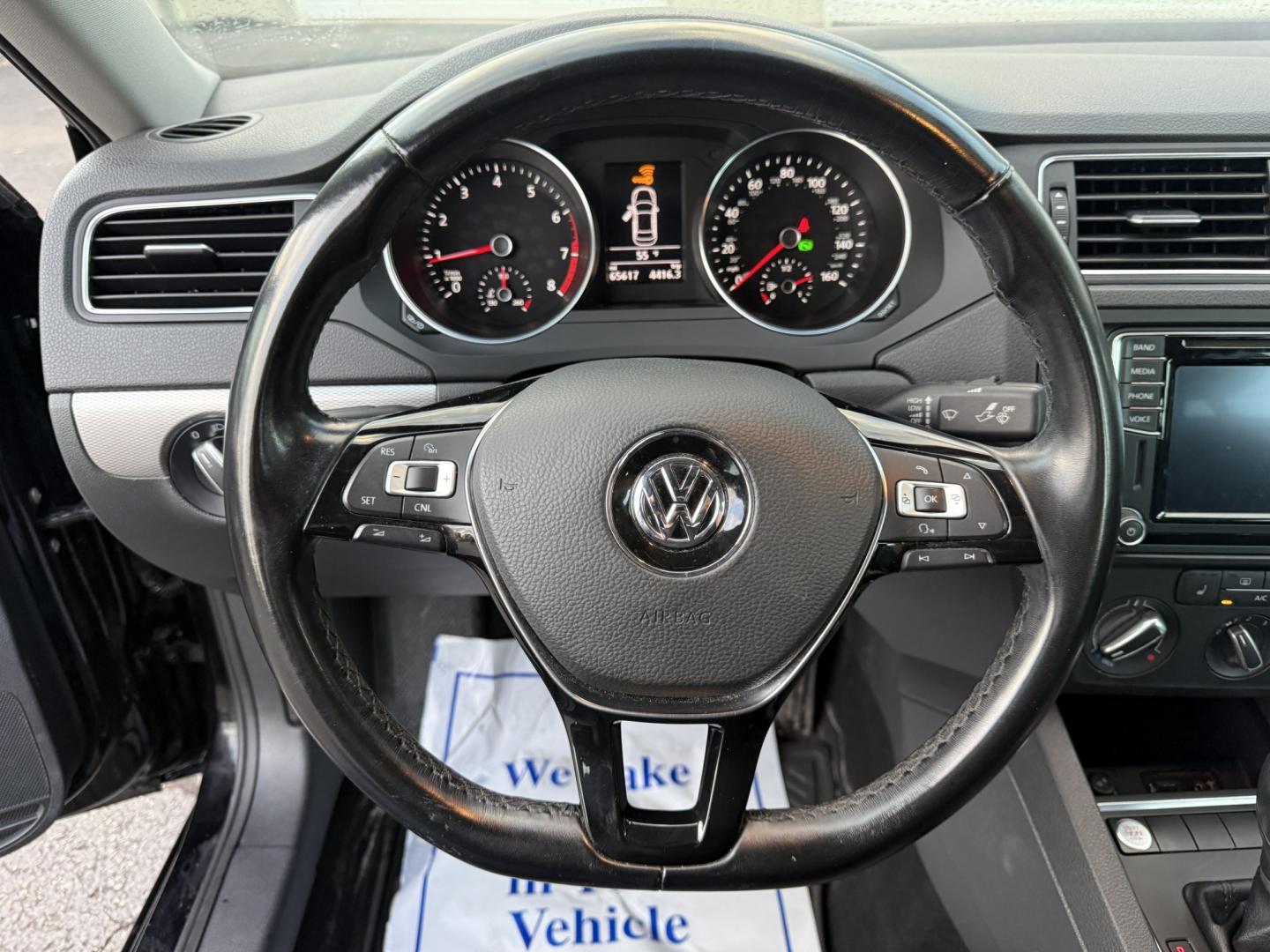 2017 Black /Black Volkswagen Jetta 1.4T SE 6A (3VWDB7AJXHM) with an 1.4L I4 DOHC 20V Turbo engine, Automatic transmission, located at 547 E. Main St., Orwell, OH, 44076, (440) 437-5893, 41.535435, -80.847855 - 2017 Volkswagen Jetta SE – Efficient German Sedan Comfort with Everyday Convenience If you want a compact sedan that feels a little more refined than a basic commuter car, this 2017 Volkswagen Jetta SE is a strong option. The 1.4L Turbocharged engine and 6-speed automatic deliver smooth everyday- Photo#12